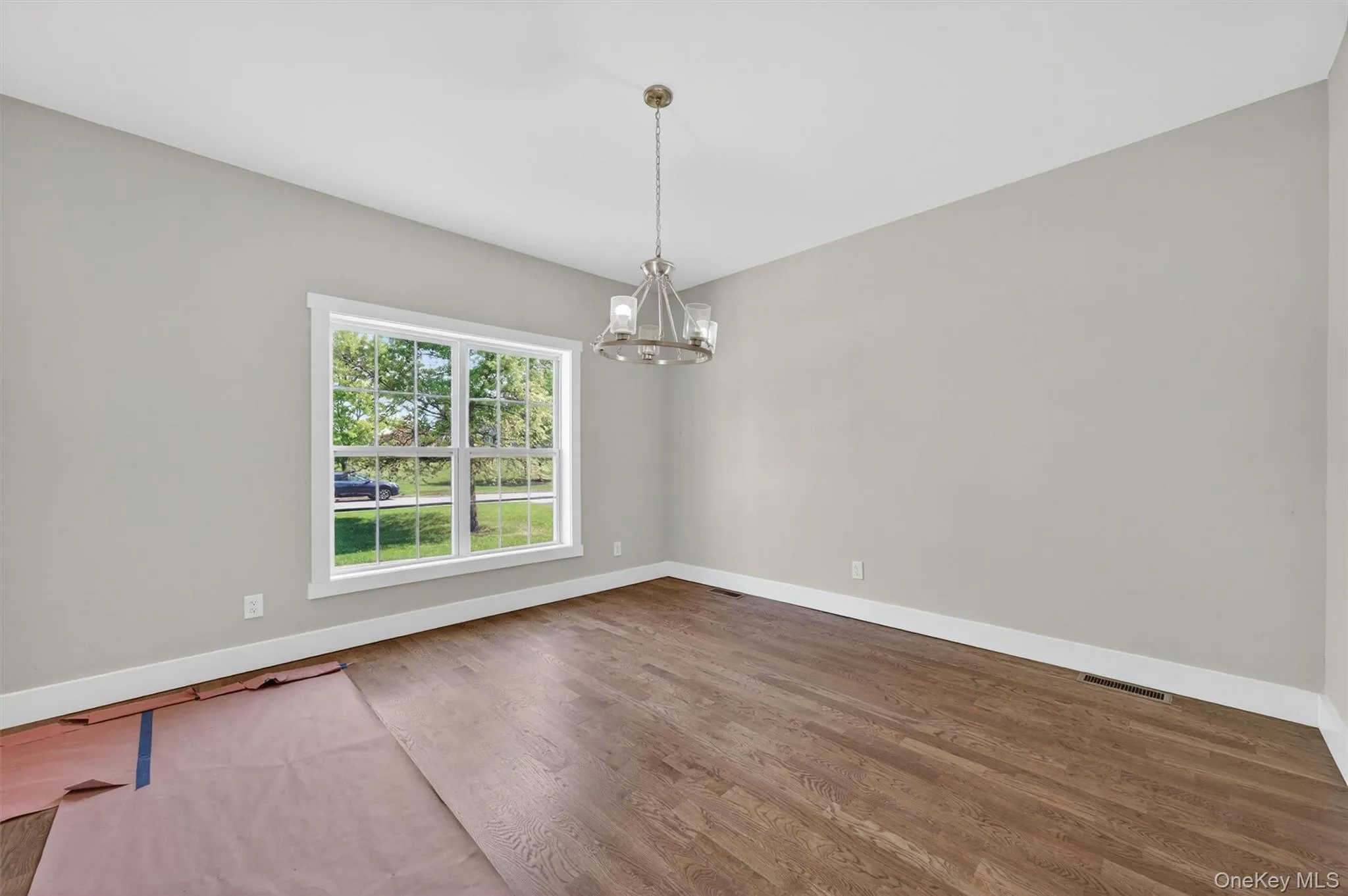 Sun-filled with hardwood flooring. Sun-filled with hardwood flooring.