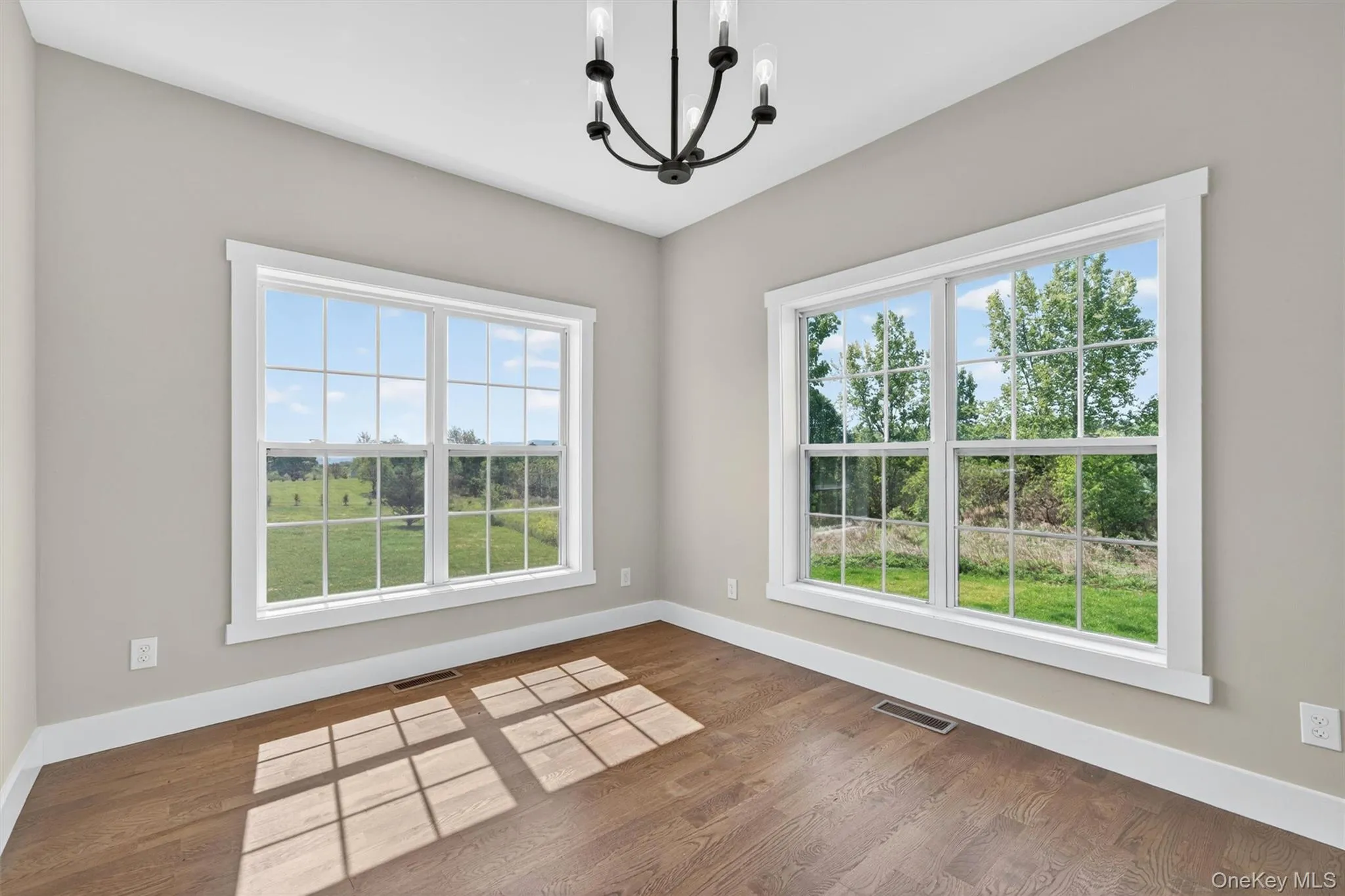 Sunny with views and hardwood flooring. Sunny with views and hardwood flooring.