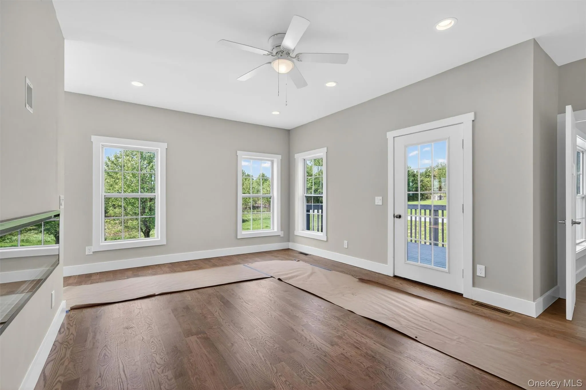 Sunny with views, a door opening to the deck and back/side yard access. Sunny with views, a door opening to the deck and back/side yard access.