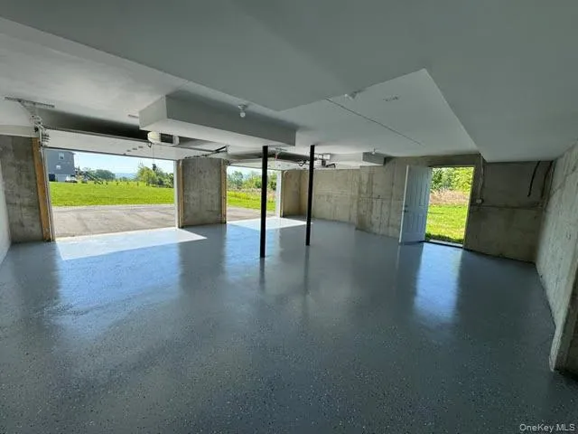 2-car garage with a small side door. 2-car garage with a small side door.