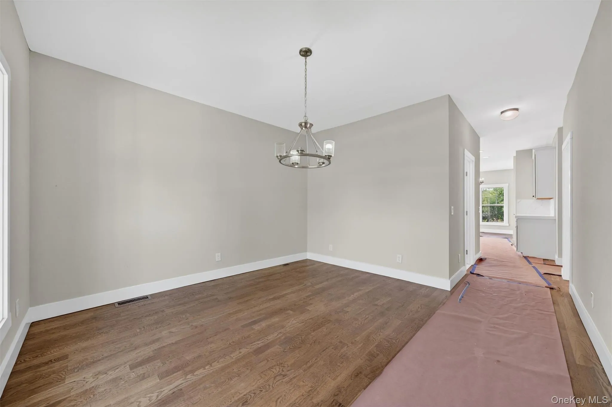 Sun-filled with hardwood flooring. Sun-filled with hardwood flooring.