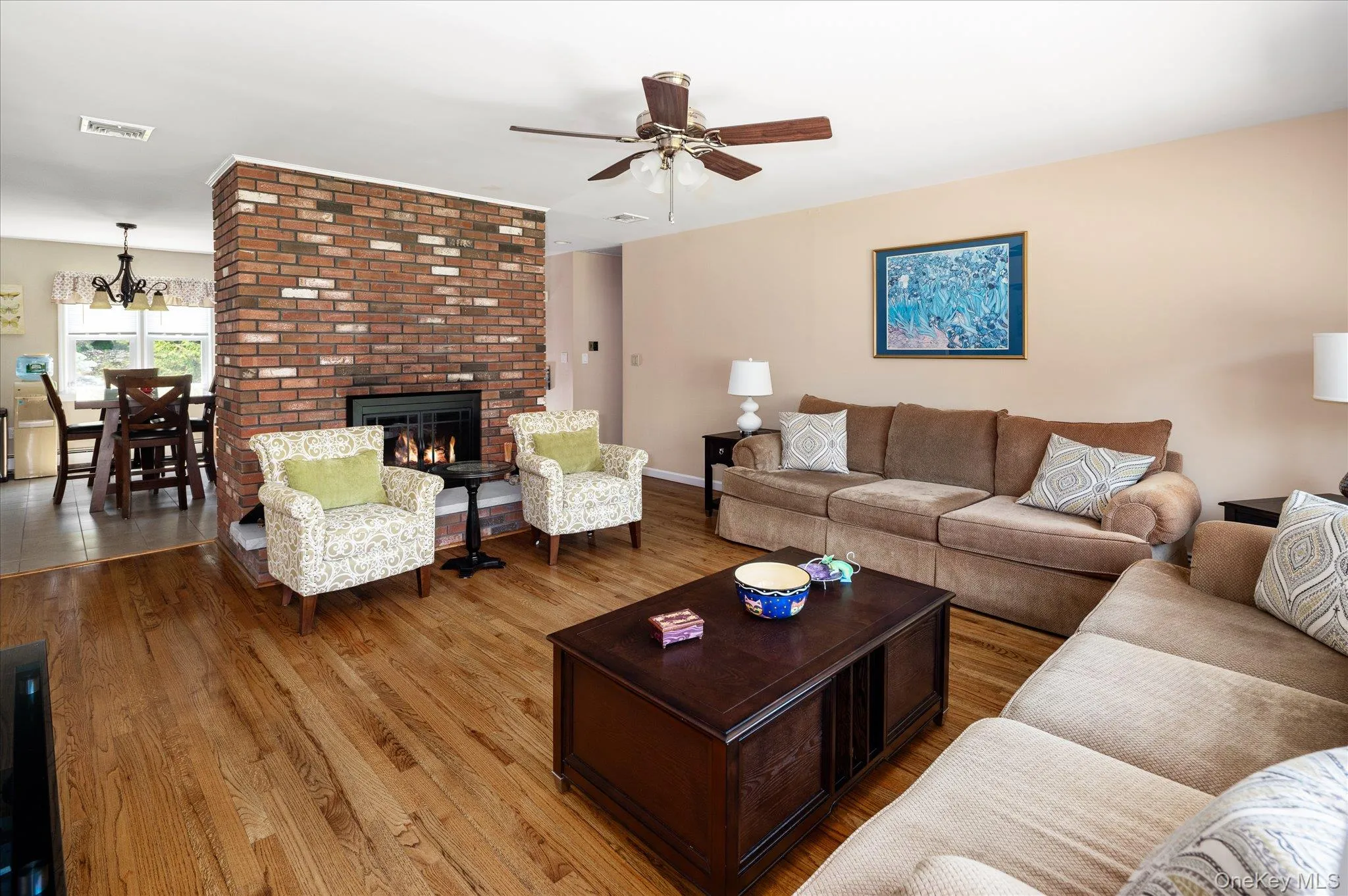 Living Room with Brick Fireplace Living Room with Brick Fireplace