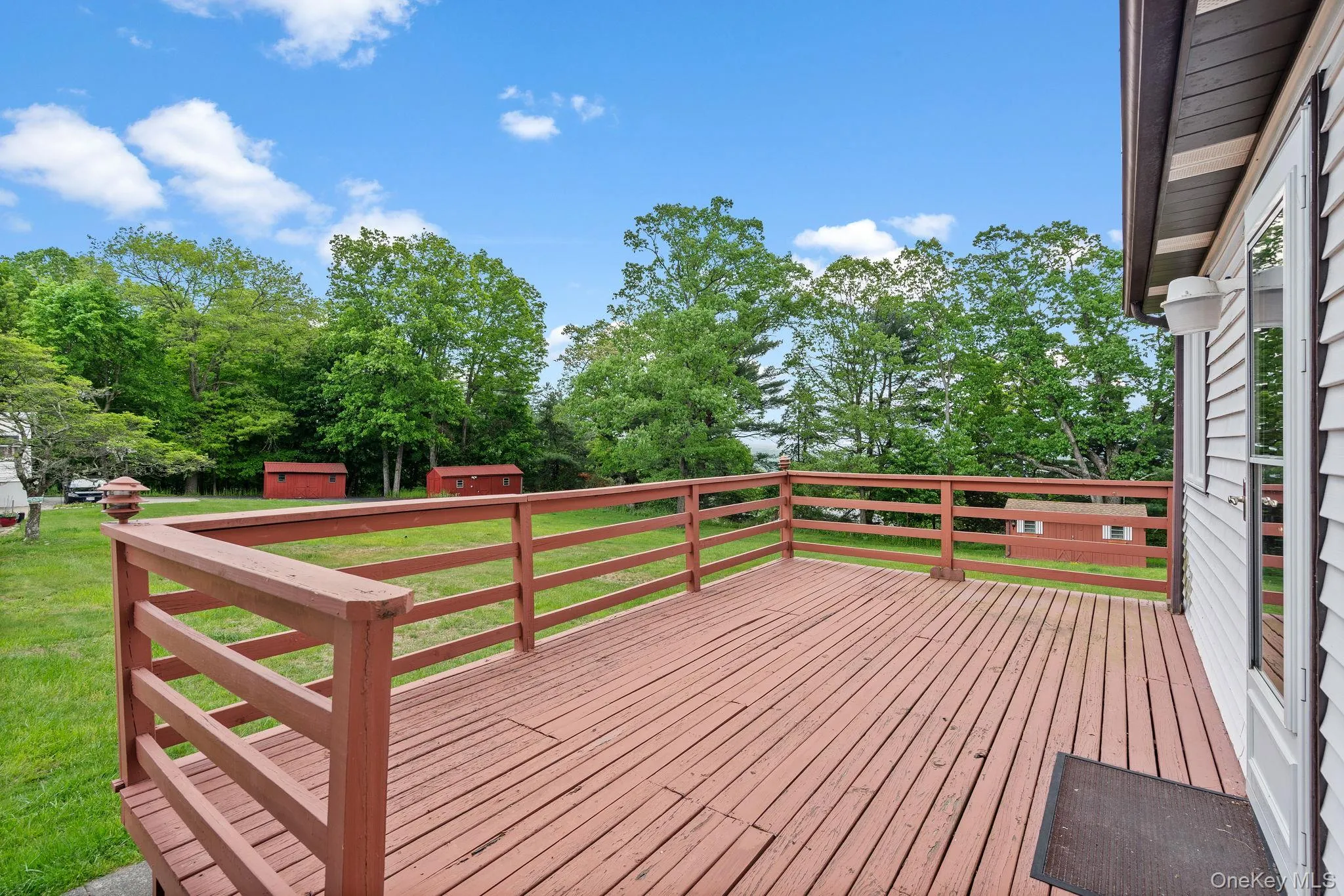 Deck overlooking the yard space. Deck overlooking the yard space.