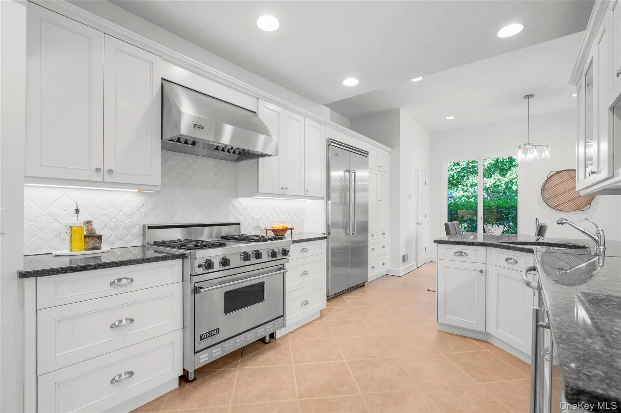 Stone countertops, Viking appliances, built in water filter, and a wine fridge. Stone countertops, Viking appliances, built in water filter, and a wine fridge.