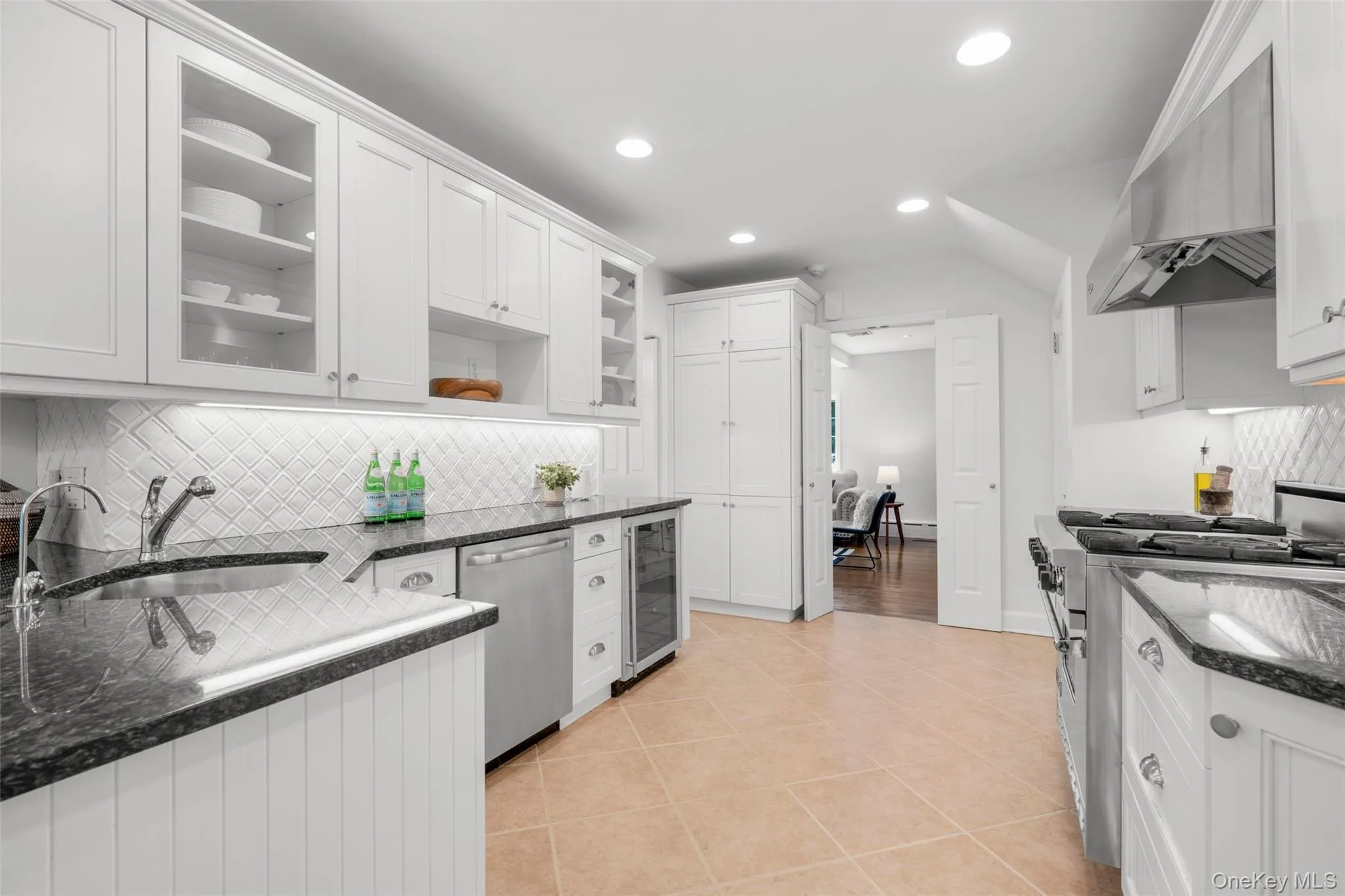 Ample cabinetry including a pantry Ample cabinetry including a pantry