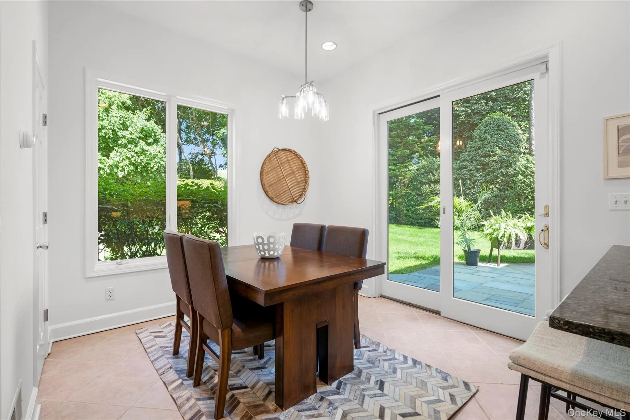 Sunny breakfast area with garden views and access to the bluestone patio. Sunny breakfast area with garden views and access to the bluestone patio.