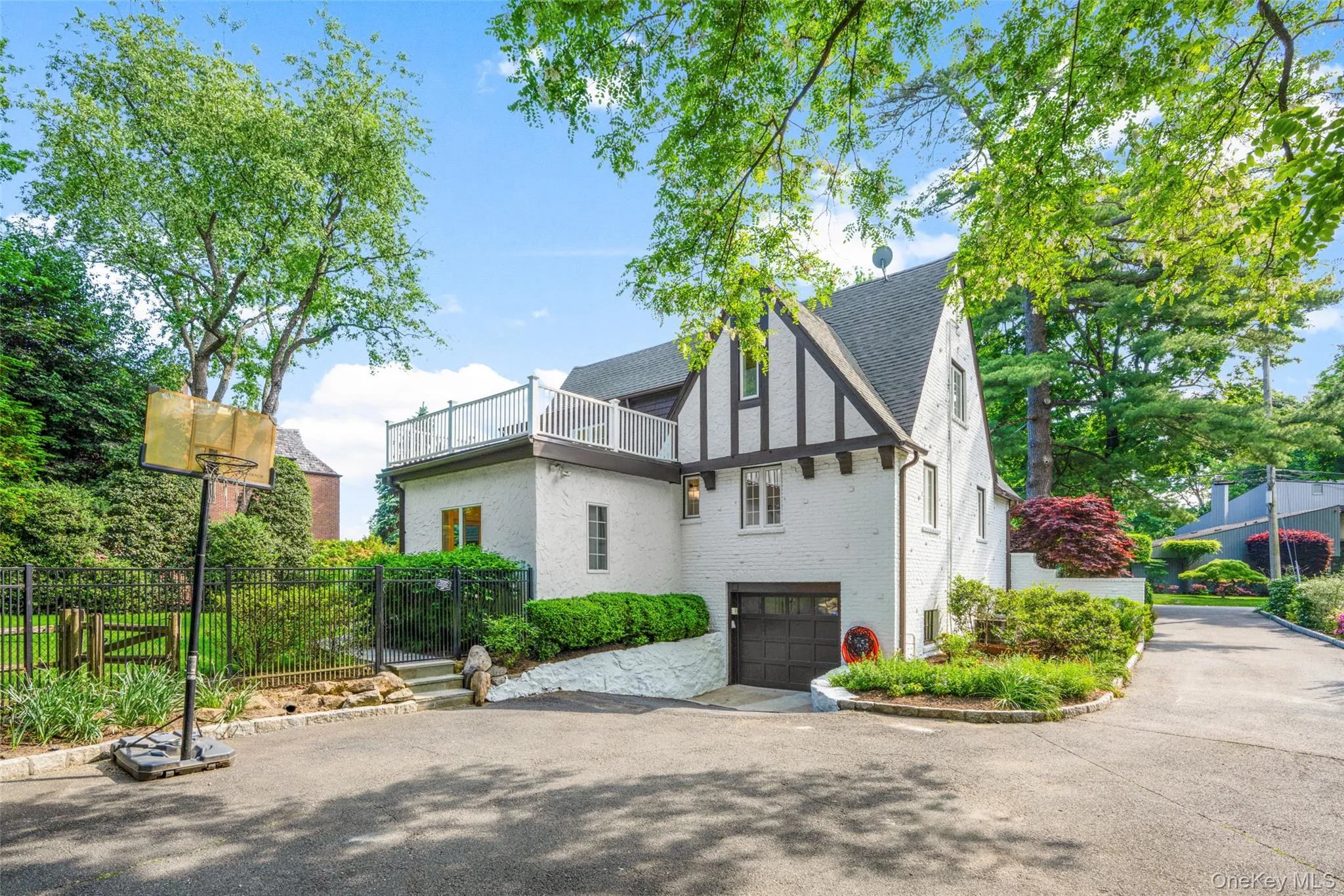 Large driveway with two-car garage. Large driveway with two-car garage.