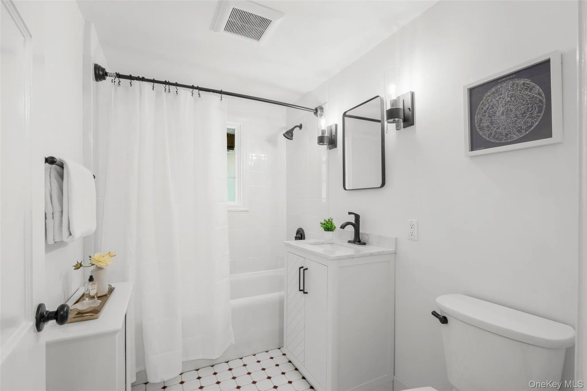 Updated full bathroom with tub. Updated full bathroom with tub.