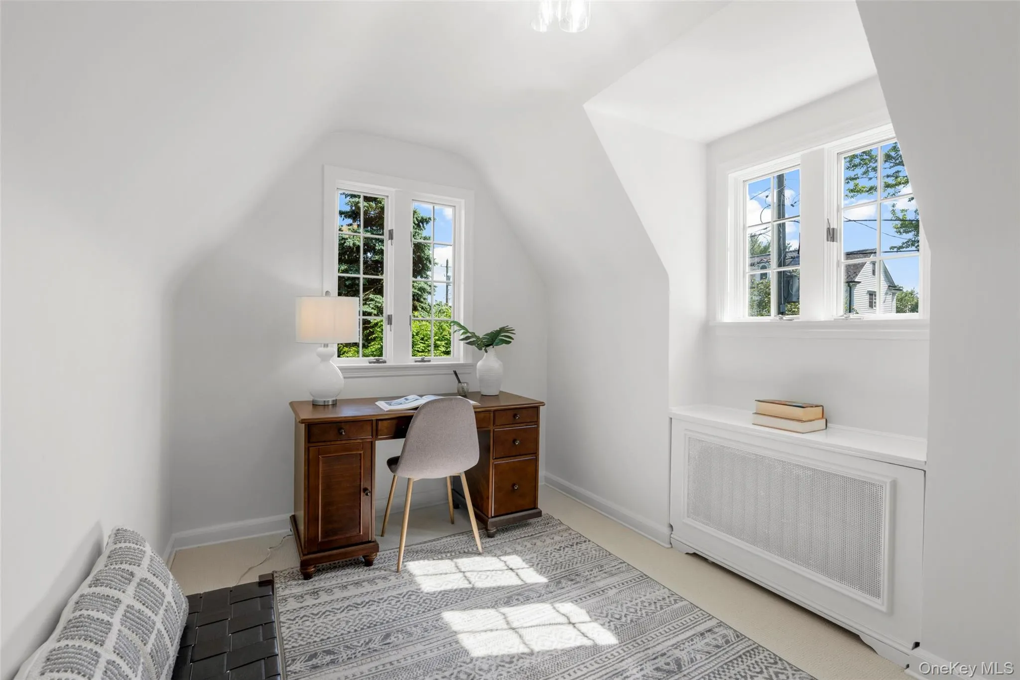 Step down to a light filled sitting room or home office retreat. Step down to a light filled sitting room or home office retreat.