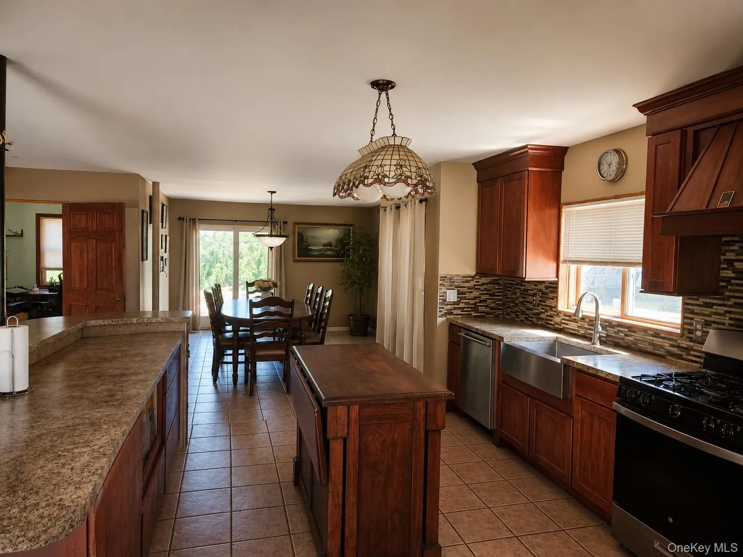 Virtually staged photo to visualize a dining room leading to the backyard Virtually staged photo to visualize a dining room leading to the backyard