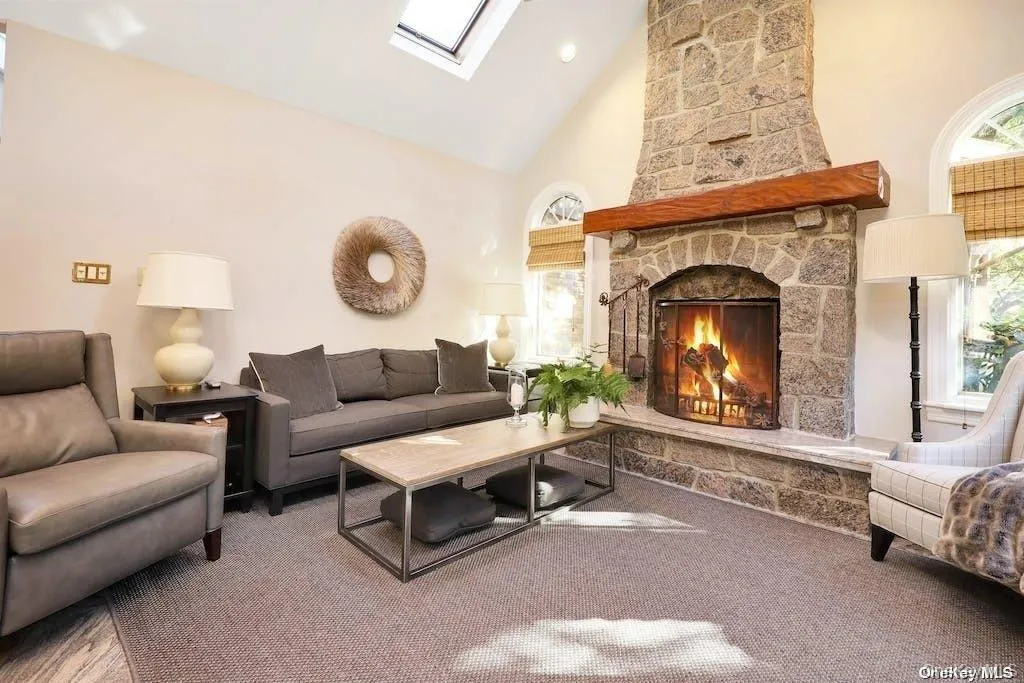 Floor to ceiling field stone wood burning fireplace Floor to ceiling field stone wood burning fireplace