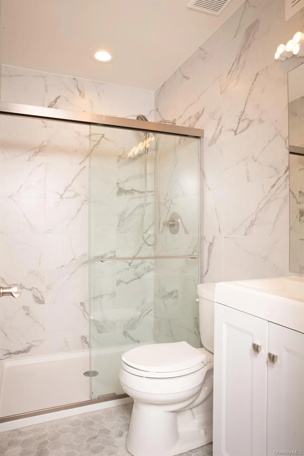 Full bath downstairs with shower Full bath downstairs with shower