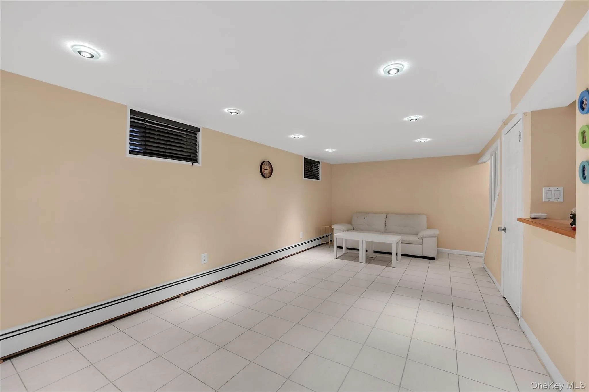 Full length of the basement with 6 windows above ground , Full length of the basement with 6 windows above ground ,