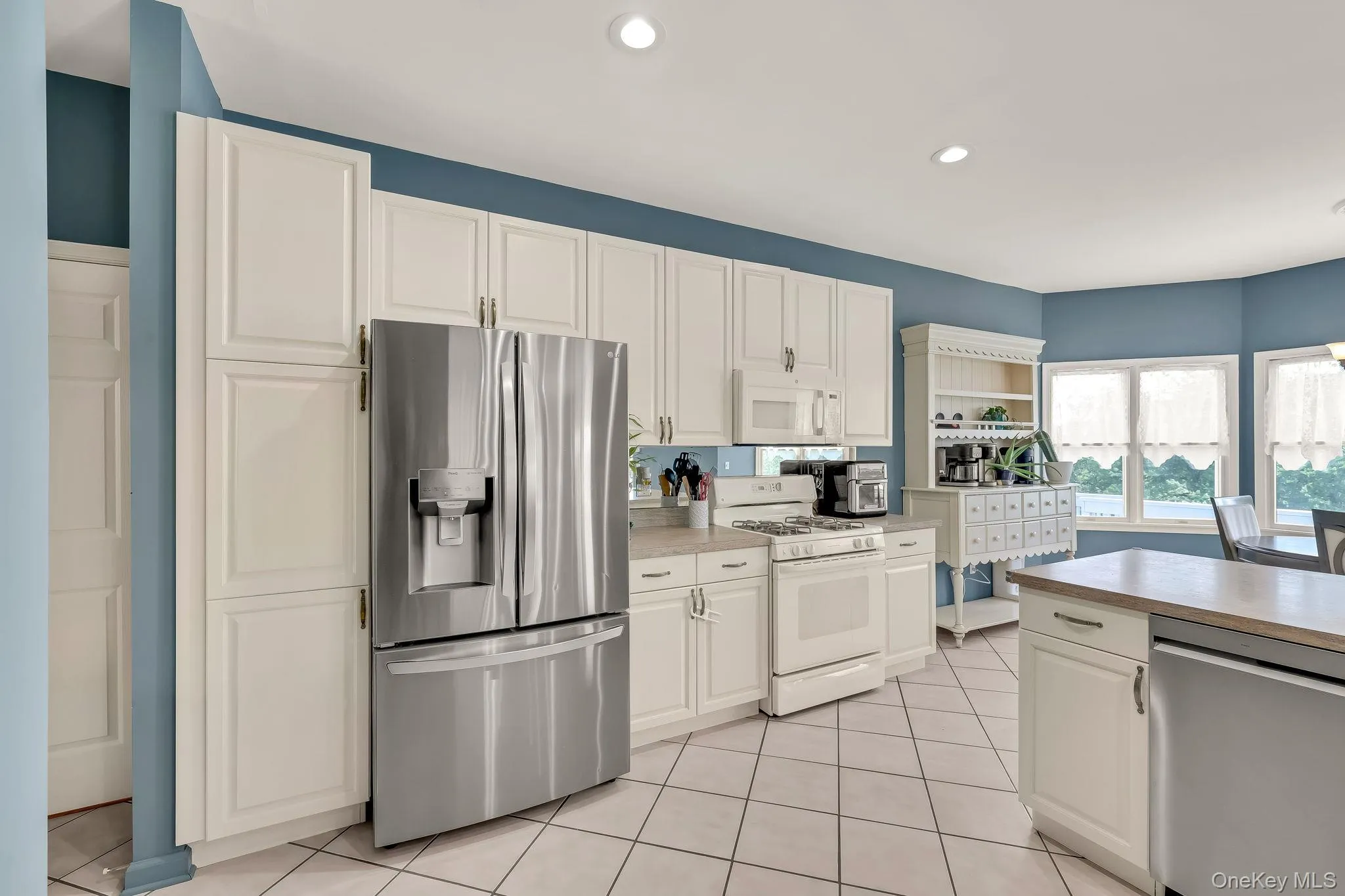 Kitchen Accented with Stainless Steel Appliances Kitchen Accented with Stainless Steel Appliances