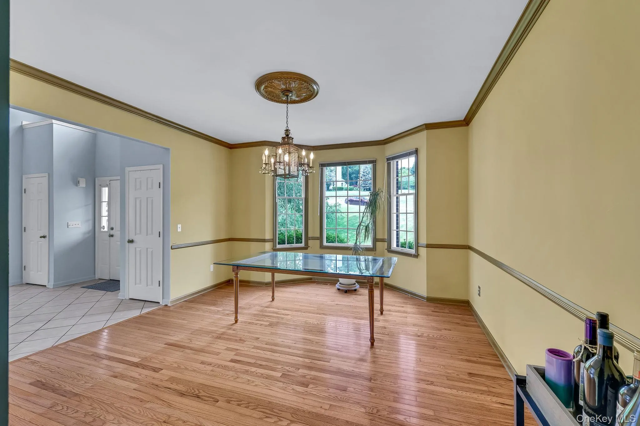 Formal Dining Room with Crown Molding and Chair Rail Formal Dining Room with Crown Molding and Chair Rail
