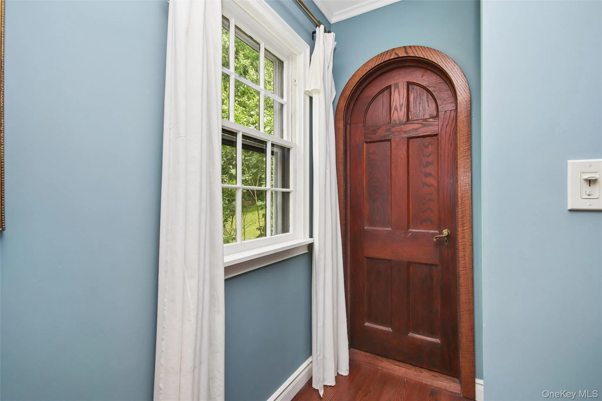 Antique curved solid wood door to bath Antique curved solid wood door to bath