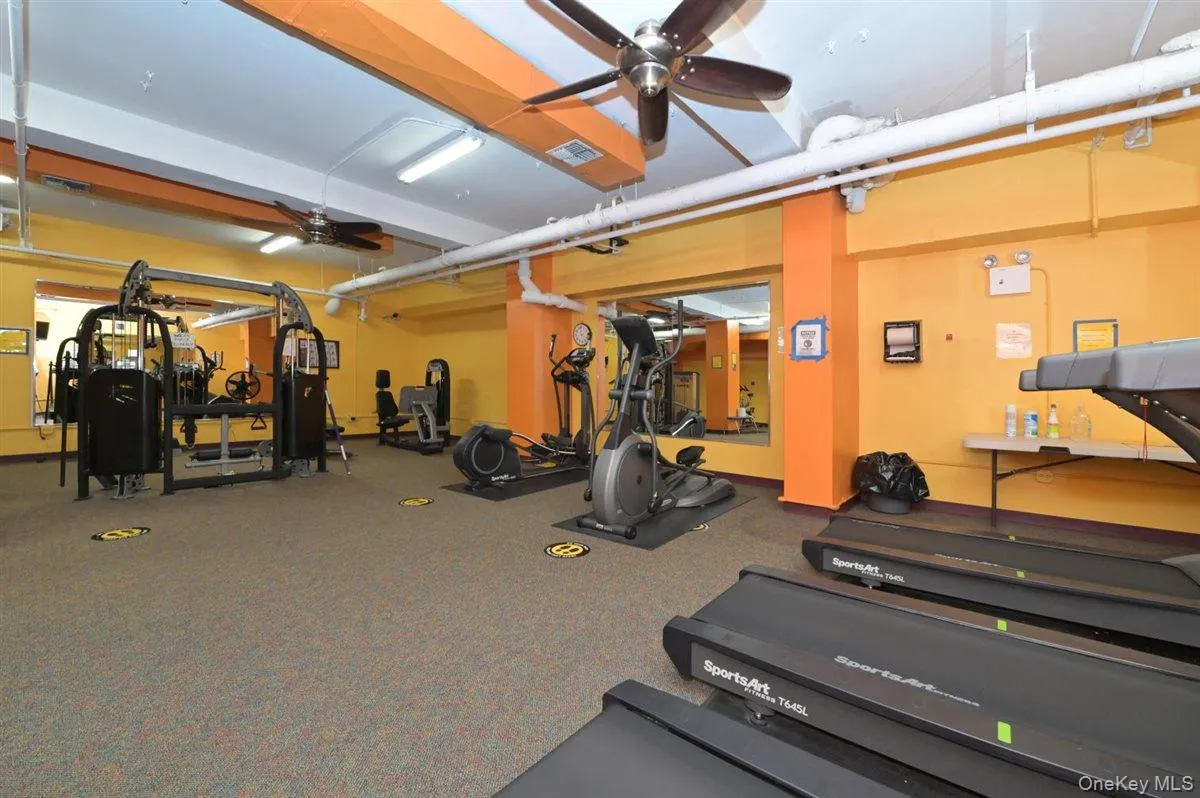 Workout area featuring a ceiling fan Workout area featuring a ceiling fan