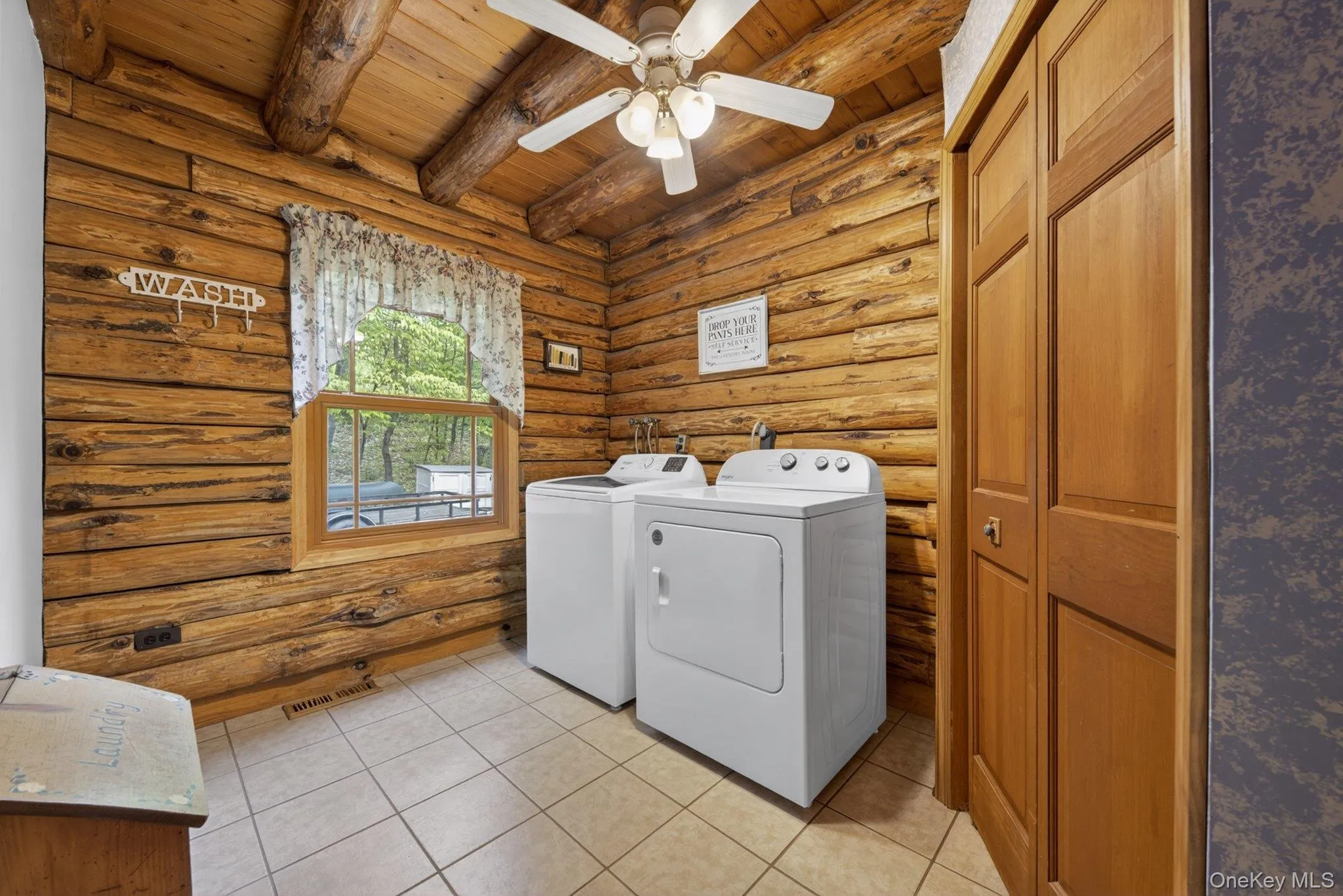 First floor laundry room with closet First floor laundry room with closet