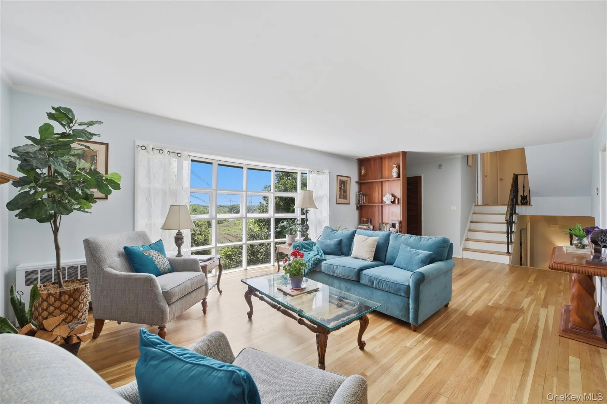 Bright & Light Living Room with Floor to Ceiling Windows and Fireplace Bright & Light Living Room with Floor to Ceiling Windows and Fireplace
