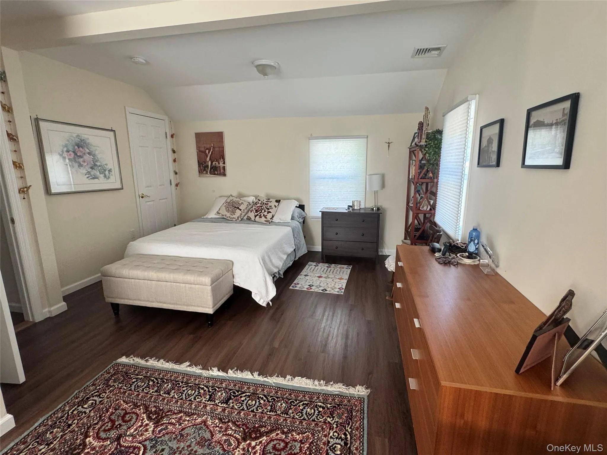 Primary Bedroom with beautiful hardwood flooring Primary Bedroom with beautiful hardwood flooring