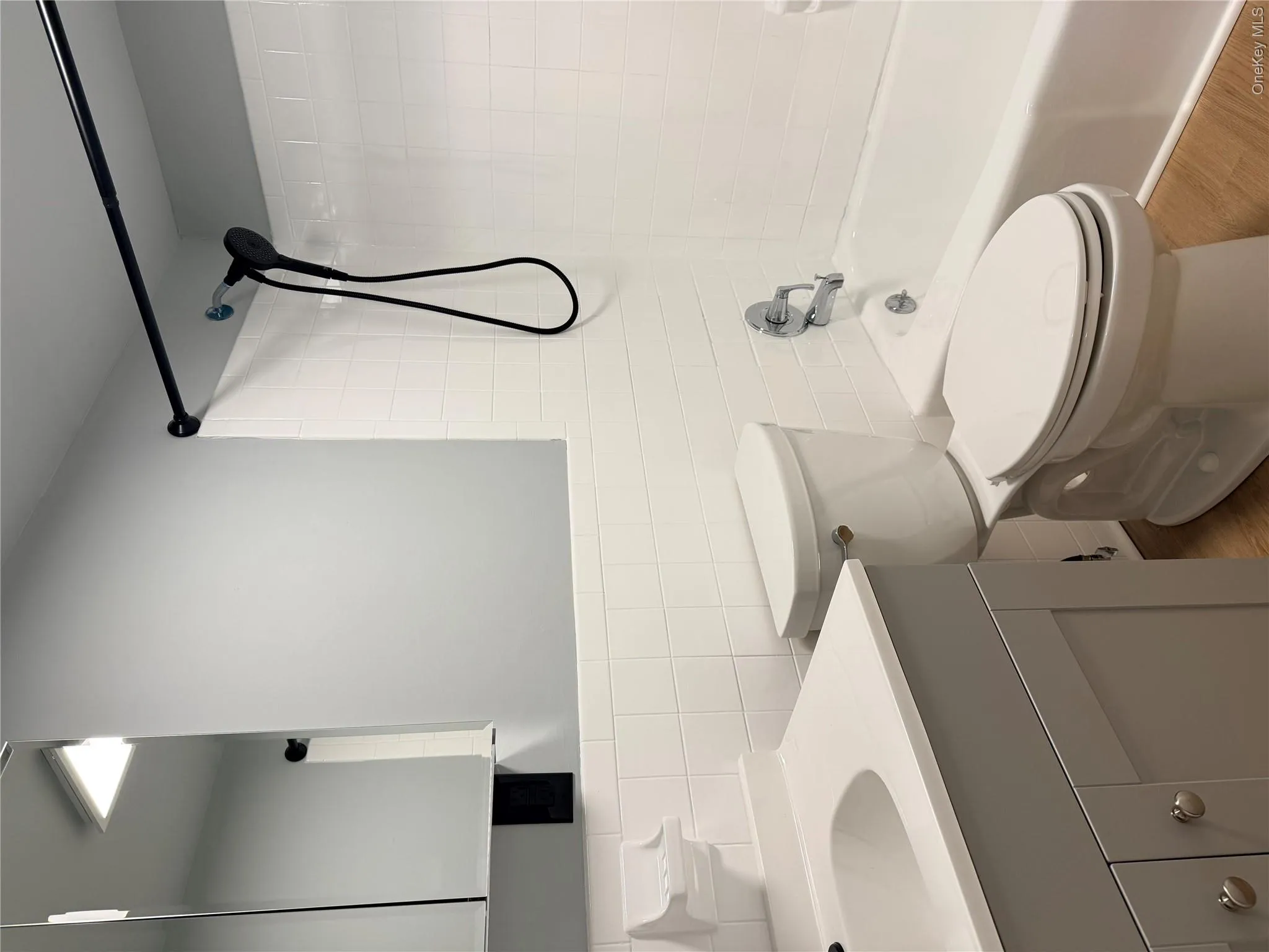Updated bathroom with new toilet, vanity and freshly painted Updated bathroom with new toilet, vanity and freshly painted