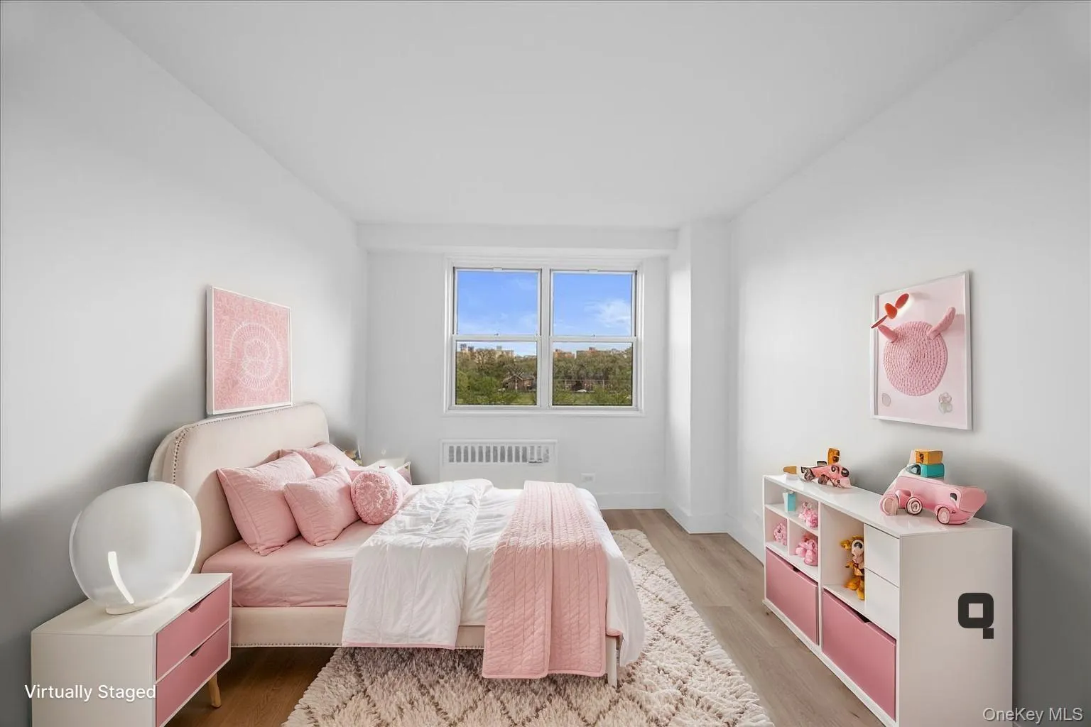 Bright interior space featuring a window with exterior views, light vinyl flooring, and white painted walls Bright interior space featuring a window with exterior views, light vinyl flooring, and white painted walls