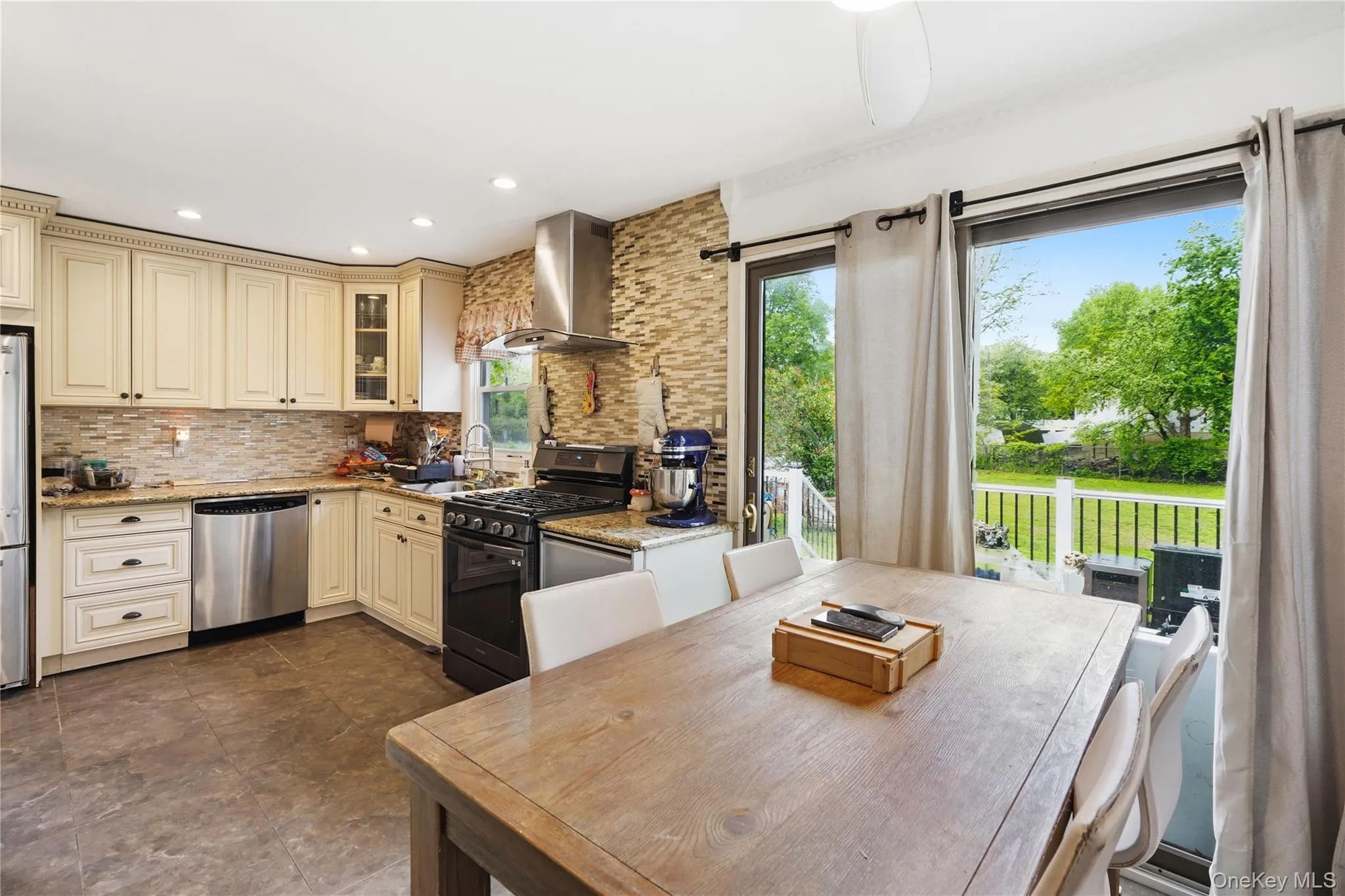 Sun drenched eat in kitchen with tons of cabinetry Sun drenched eat in kitchen with tons of cabinetry