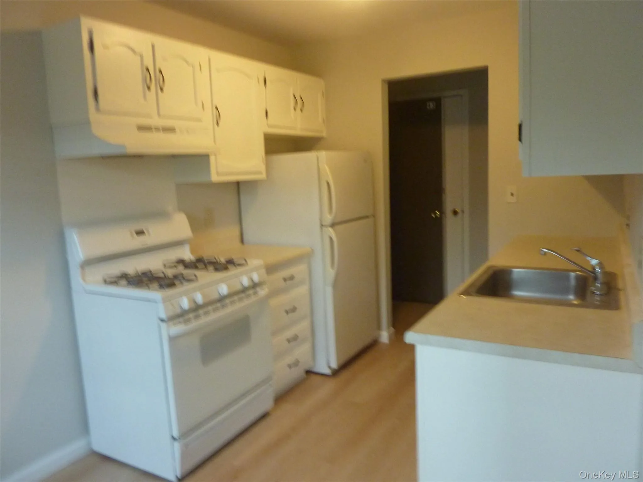 Galley Kitchen with Refrigerator, Stove & Dishwasher Galley Kitchen with Refrigerator, Stove & Dishwasher