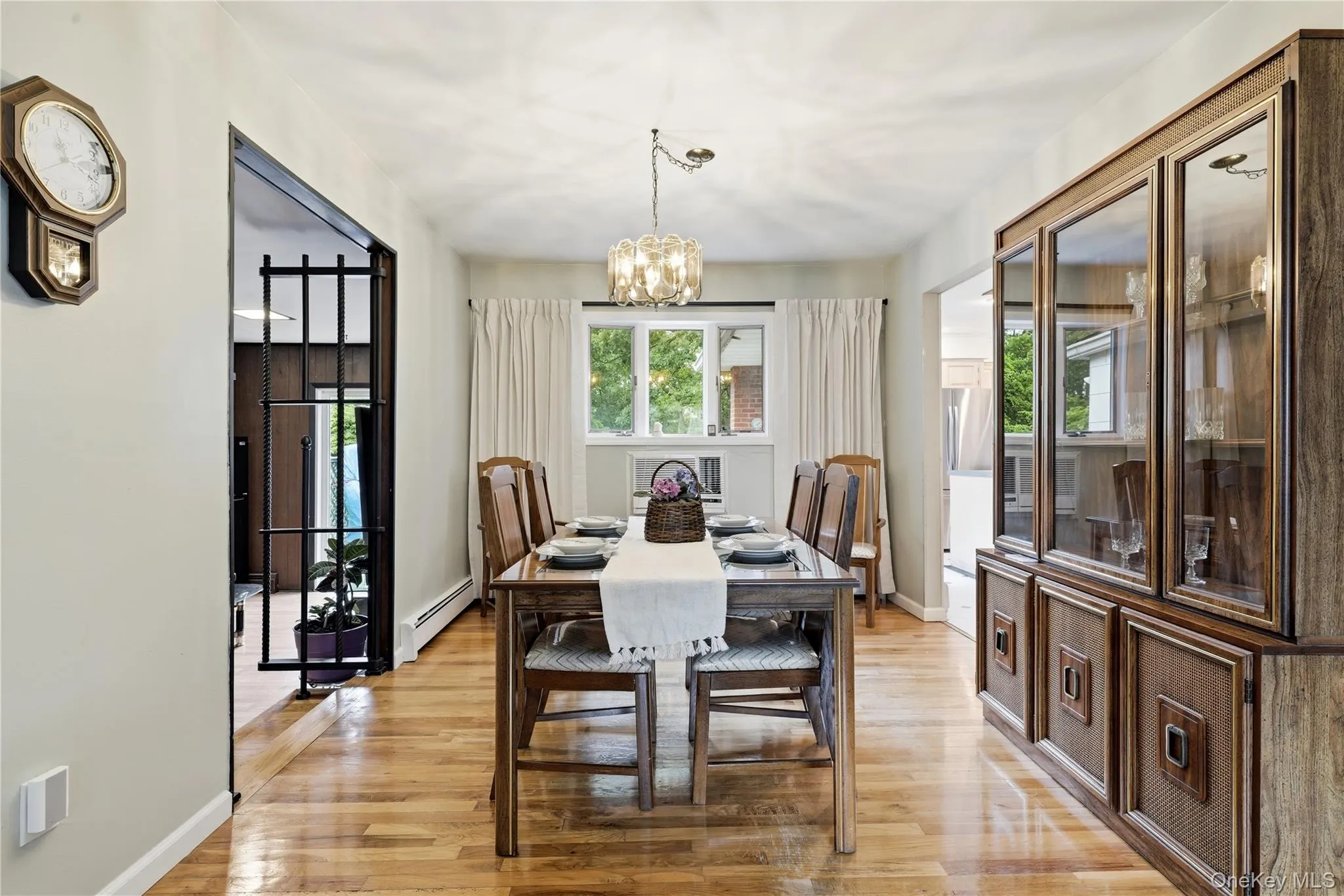 Dining Room with Kitchen and Den on Either Side Dining Room with Kitchen and Den on Either Side
