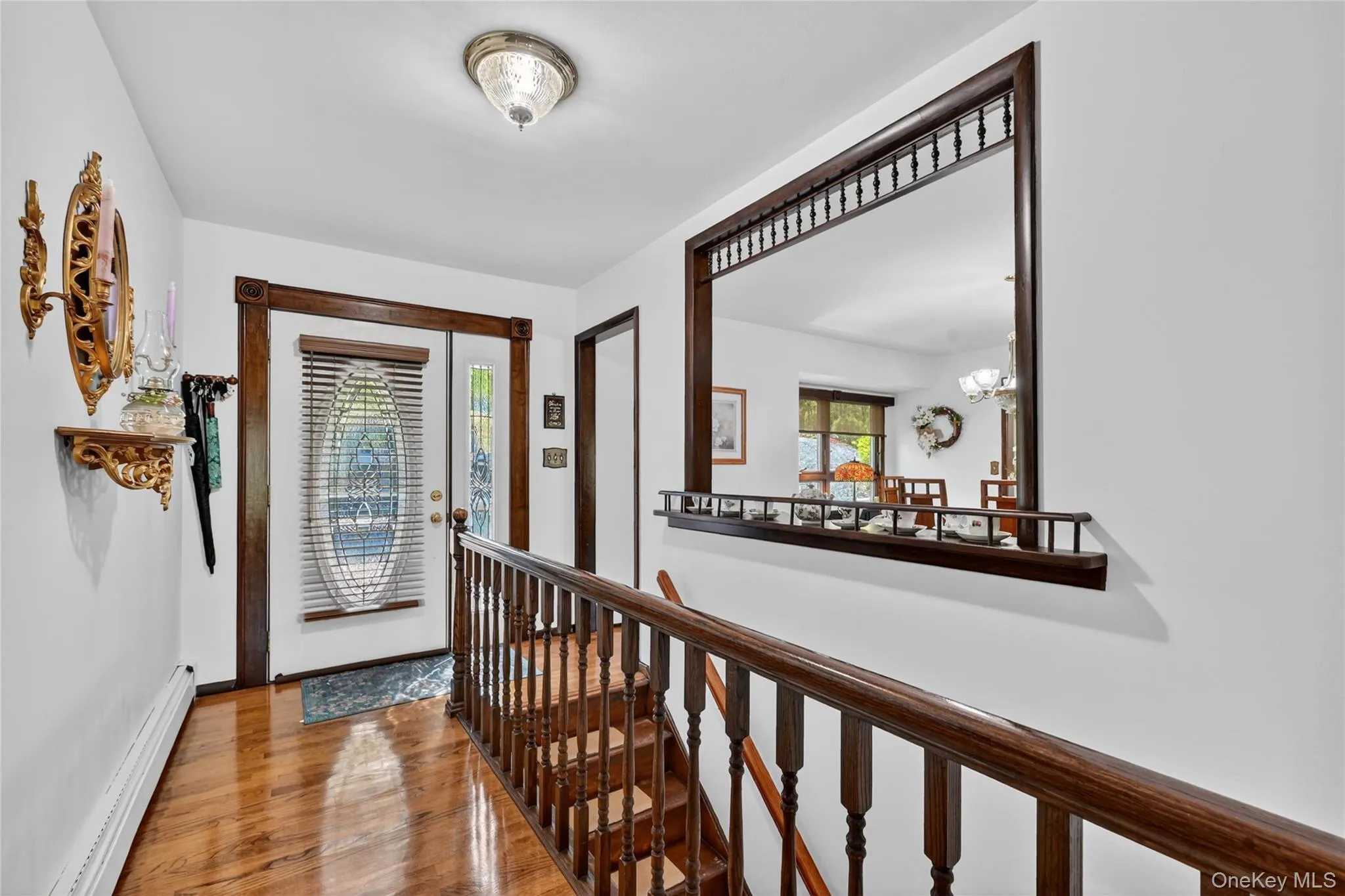 Gleaming hardwood floors greet guests. Gleaming hardwood floors greet guests.