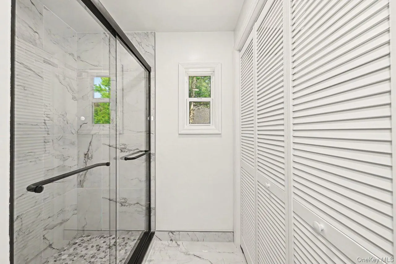 2nd floor bath has a step in shower. 2nd floor bath has a step in shower.
