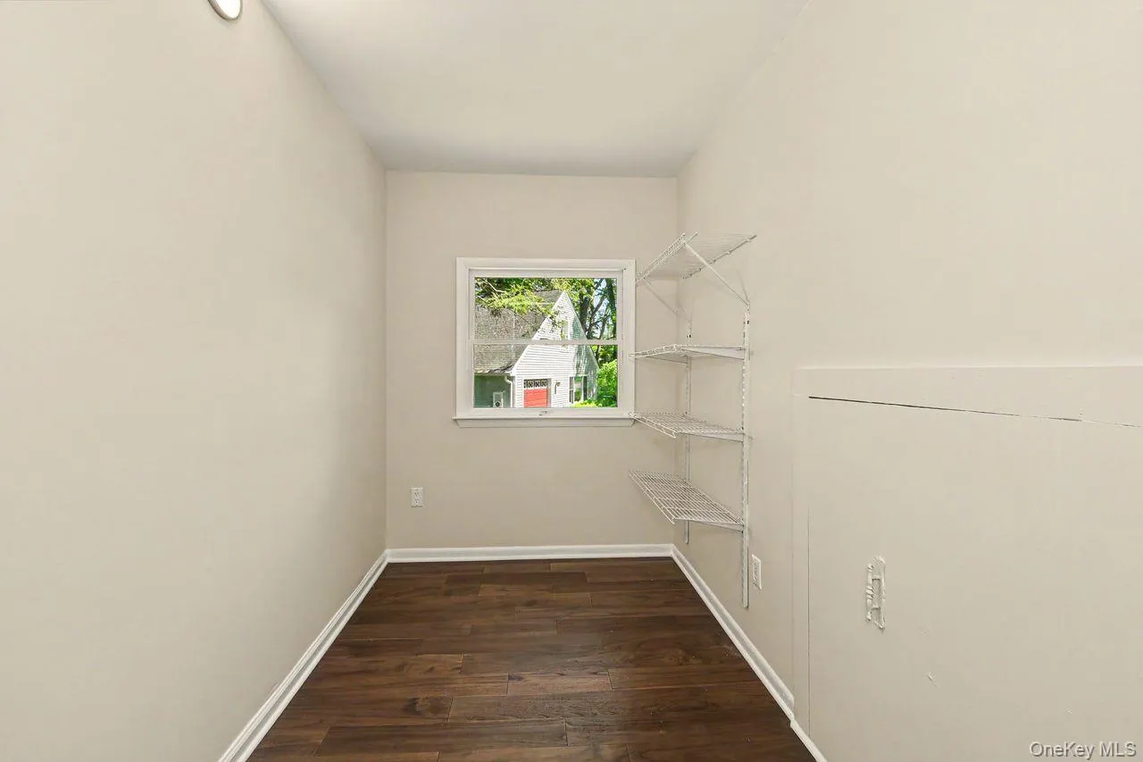 Primary Bedroom walk-in closet Primary Bedroom walk-in closet