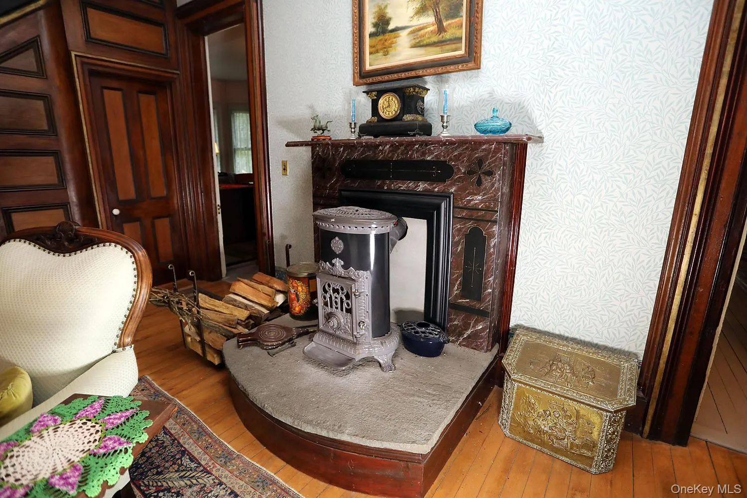 Fireplace area with ornate wood stove Fireplace area with ornate wood stove