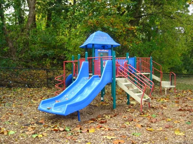 Garth Road Playground - Garth Road is a self contained tree lined street and 1/2 mile long starting at the Scarsdale Metro North Train Station and ending at the ball field. Easy walk to Scarsdale village and train. It's only a 33 minute train ride to Grand Central Terminal. As a resident you are entitled to join the Town’s Lake Isle Park, that features a Par 70, 18 hole golf course, 8 Tennis courts and 5 swimming pools including a 50 meter Olympic Pool with eight racing lanes. Garth Road Playground - Garth Road is a self contained tree lined street and 1/2 mile long starting at the Scarsdale Metro North Train Station and ending at the ball field. Easy walk to Scarsdale village and train. It's only a 33 minute train ride to Grand Central Terminal. As a resident you are entitled to join the Town’s Lake Isle Park, that features a Par 70, 18 hole golf course, 8 Tennis courts and 5 swimming pools including a 50 meter Olympic Pool with eight racing lanes.