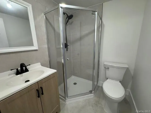 Bathroom #2 with view of the shower, sink and vanity and toilet. Bathroom #2 with view of the shower, sink and vanity and toilet.