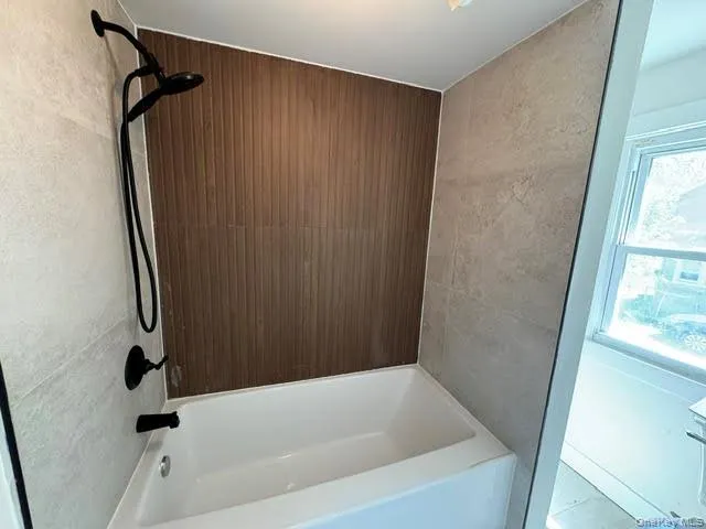 Bathroom #1 with a tub on first floor. Bathroom #1 with a tub on first floor.