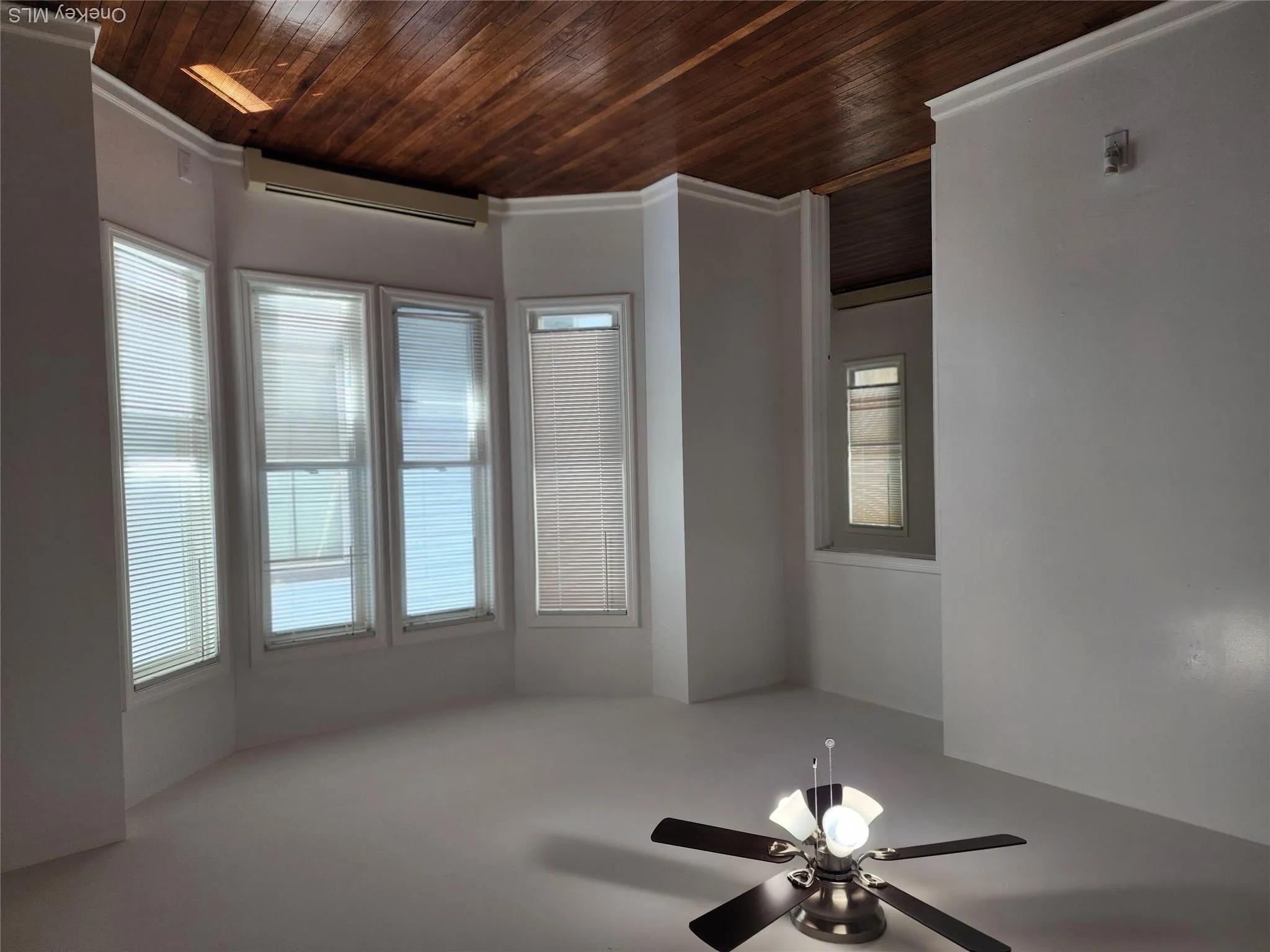 Livingroom with Hardwood flooring throughout featuring entrance to bedroom 3 Livingroom with Hardwood flooring throughout featuring entrance to bedroom 3
