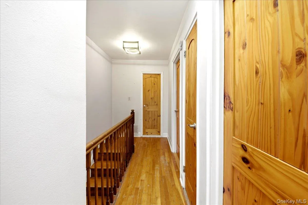 2nd floor hallway with hardwood floors and solid wood doors 2nd floor hallway with hardwood floors and solid wood doors