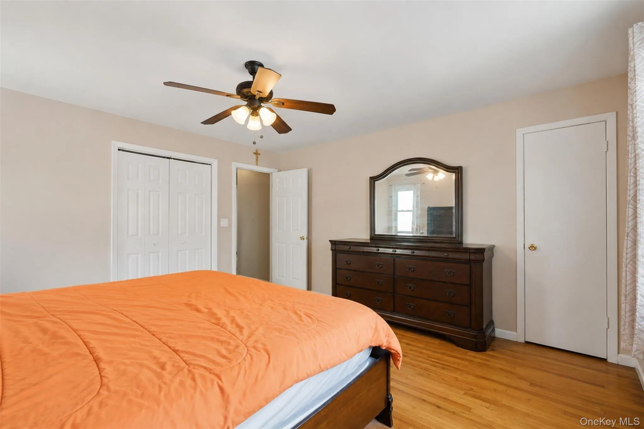 Hardwood flooring throughout featuring white trim and neutral wall tones Hardwood flooring throughout featuring white trim and neutral wall tones