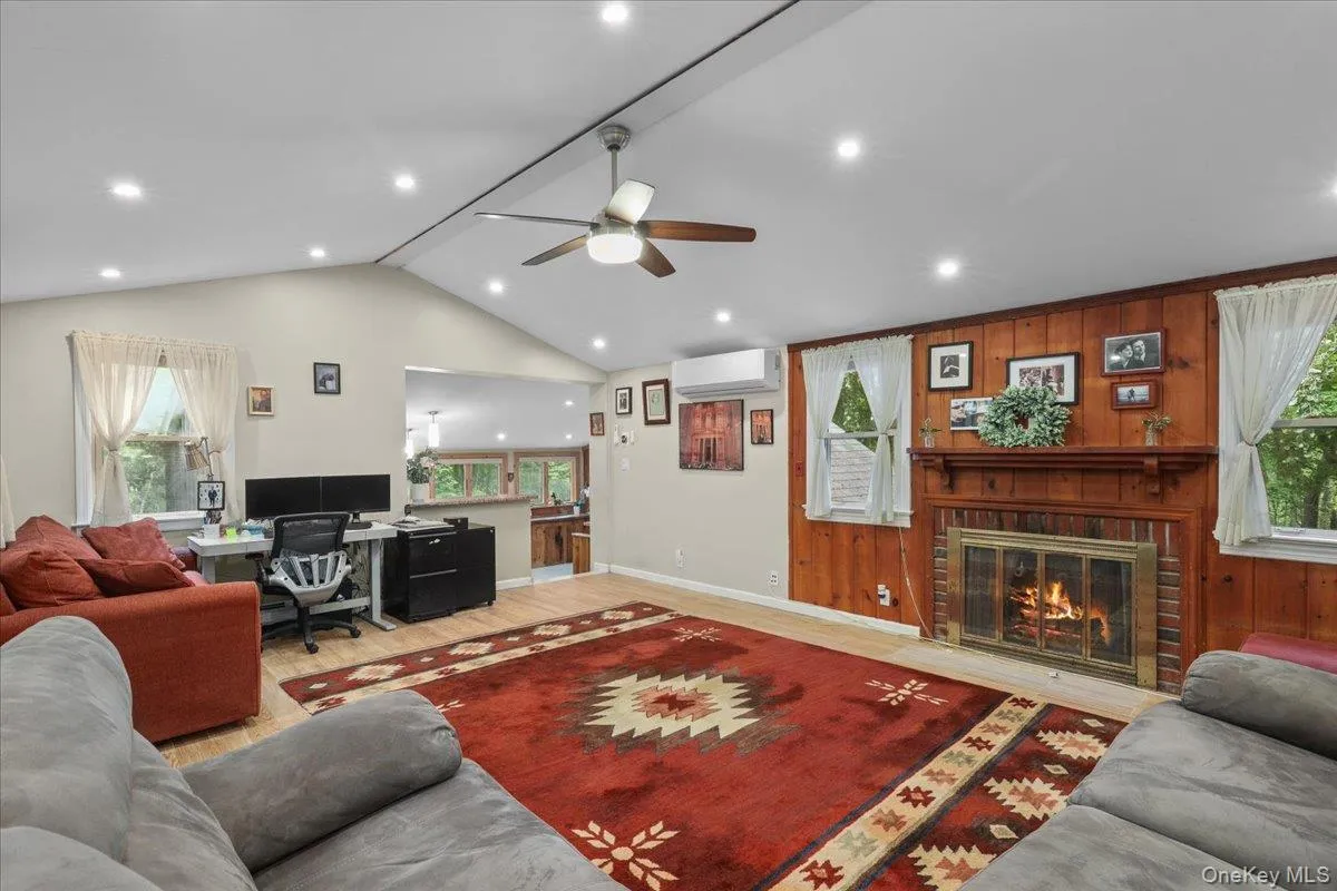 Living Room w/Wood-Burning Fireplace Living Room w/Wood-Burning Fireplace
