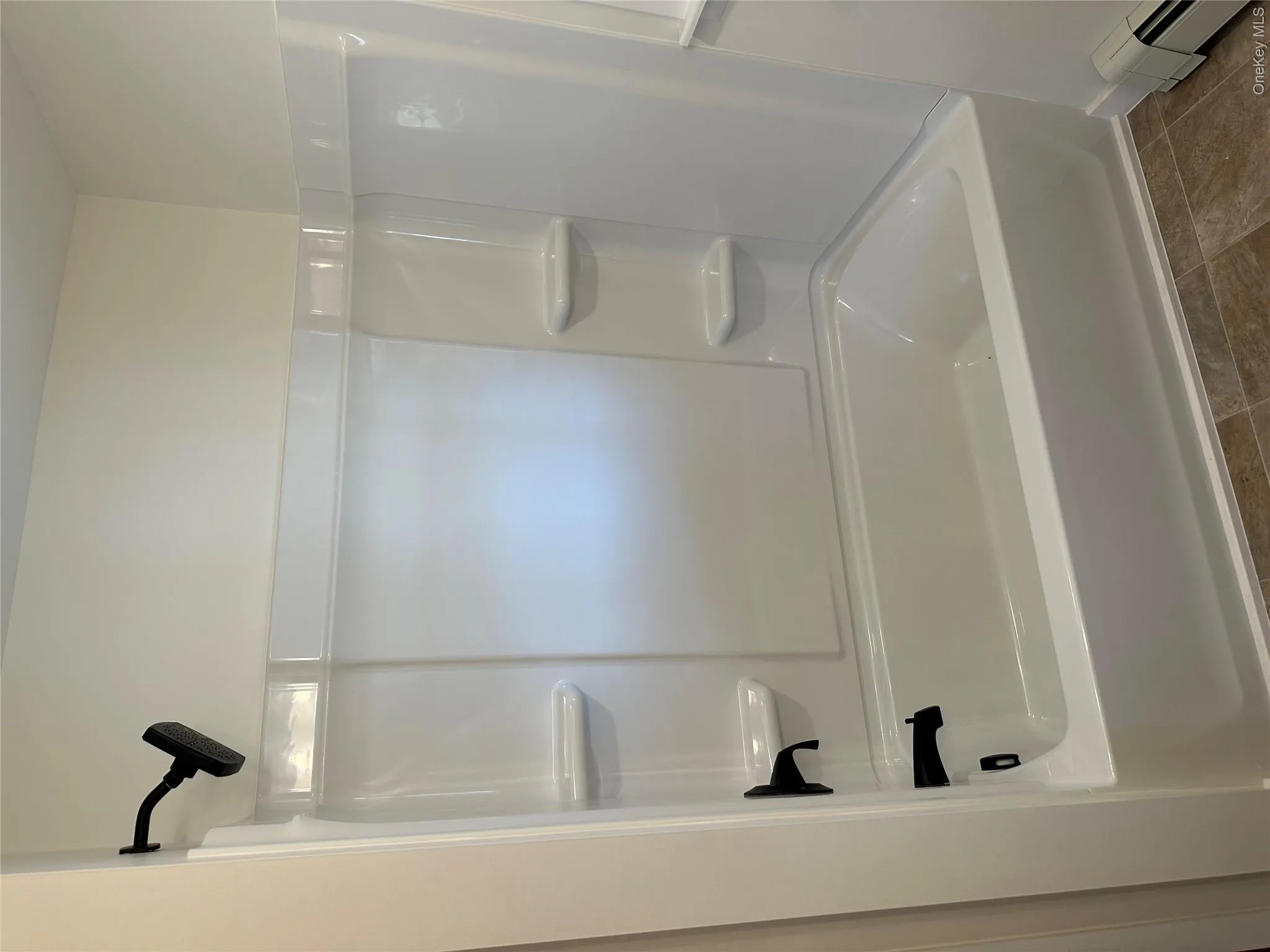 Clean crisp white bathroom with matte black fixtures Clean crisp white bathroom with matte black fixtures