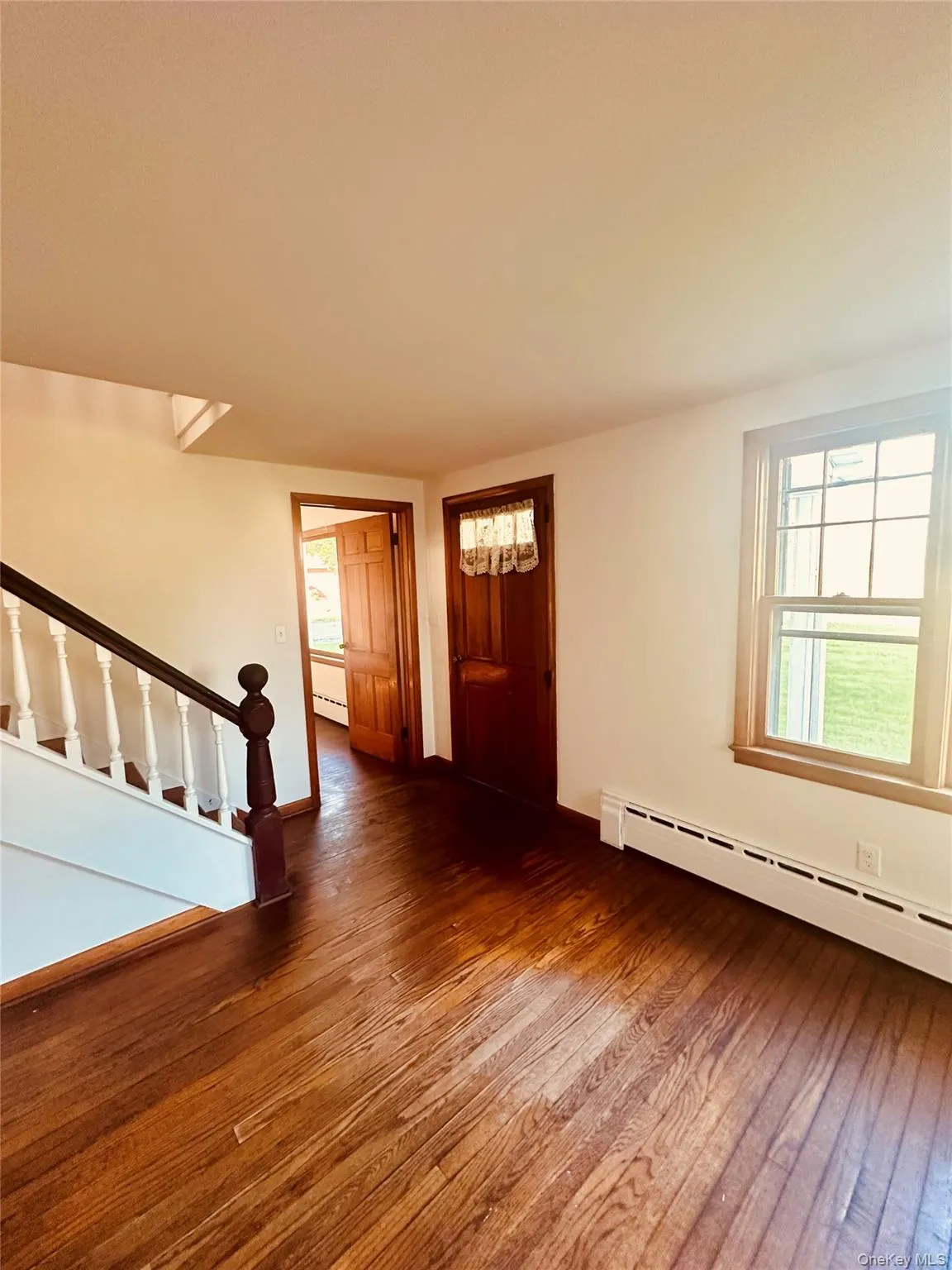 Hardwood floors and stairs to the second level Hardwood floors and stairs to the second level