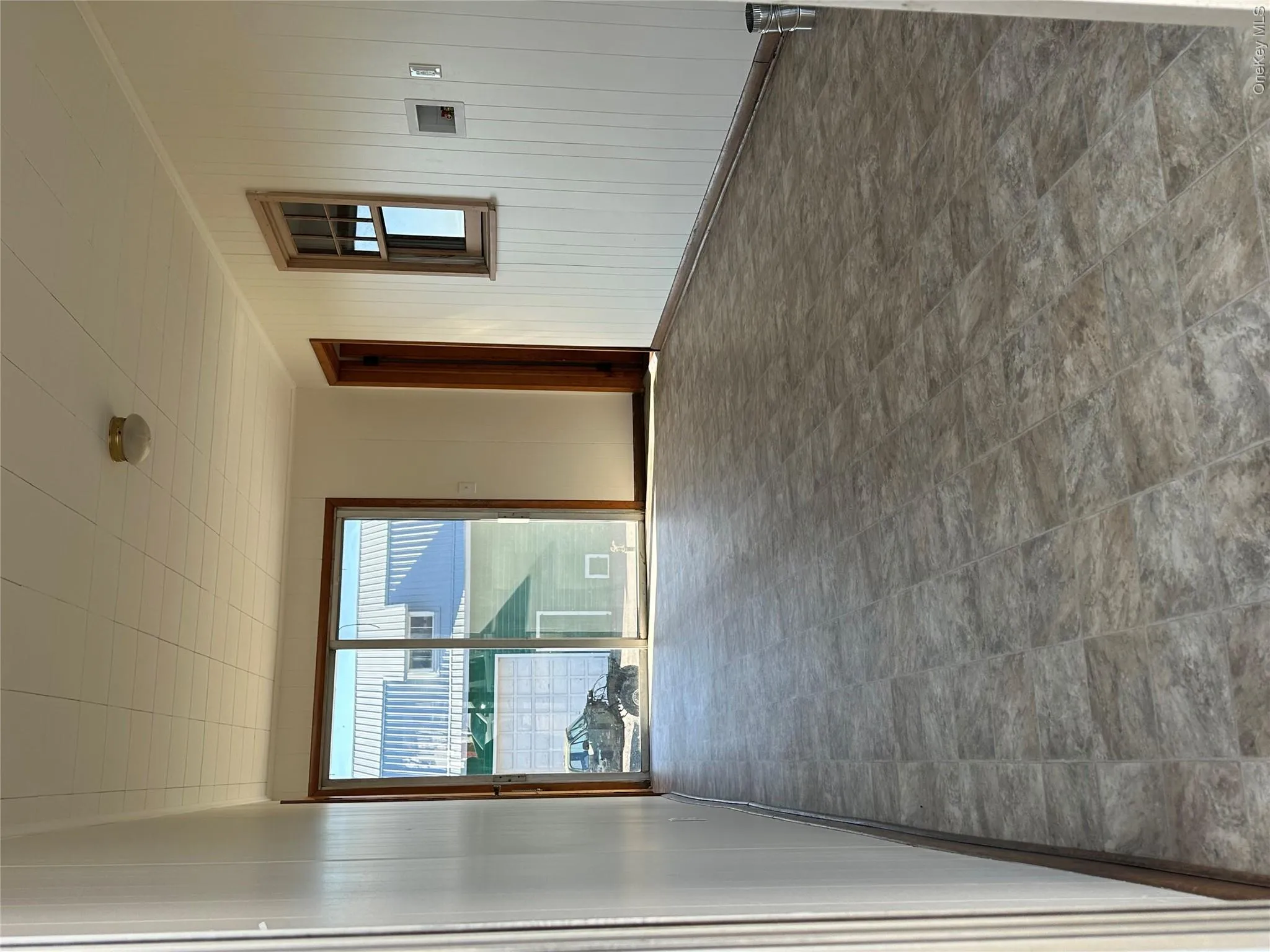 Breezeway with laundry Hook ups and access to the garage Breezeway with laundry Hook ups and access to the garage