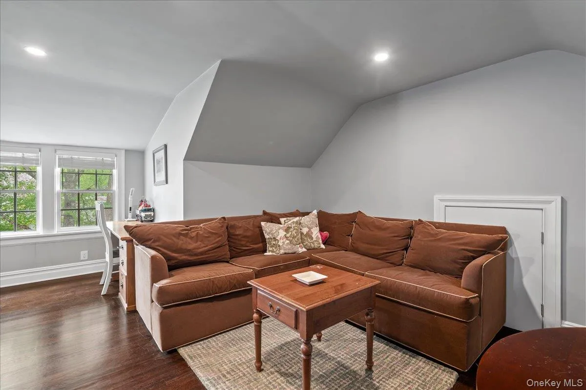 Third level features a bedroom, separate sitting area and full bathroom. Third level features a bedroom, separate sitting area and full bathroom.