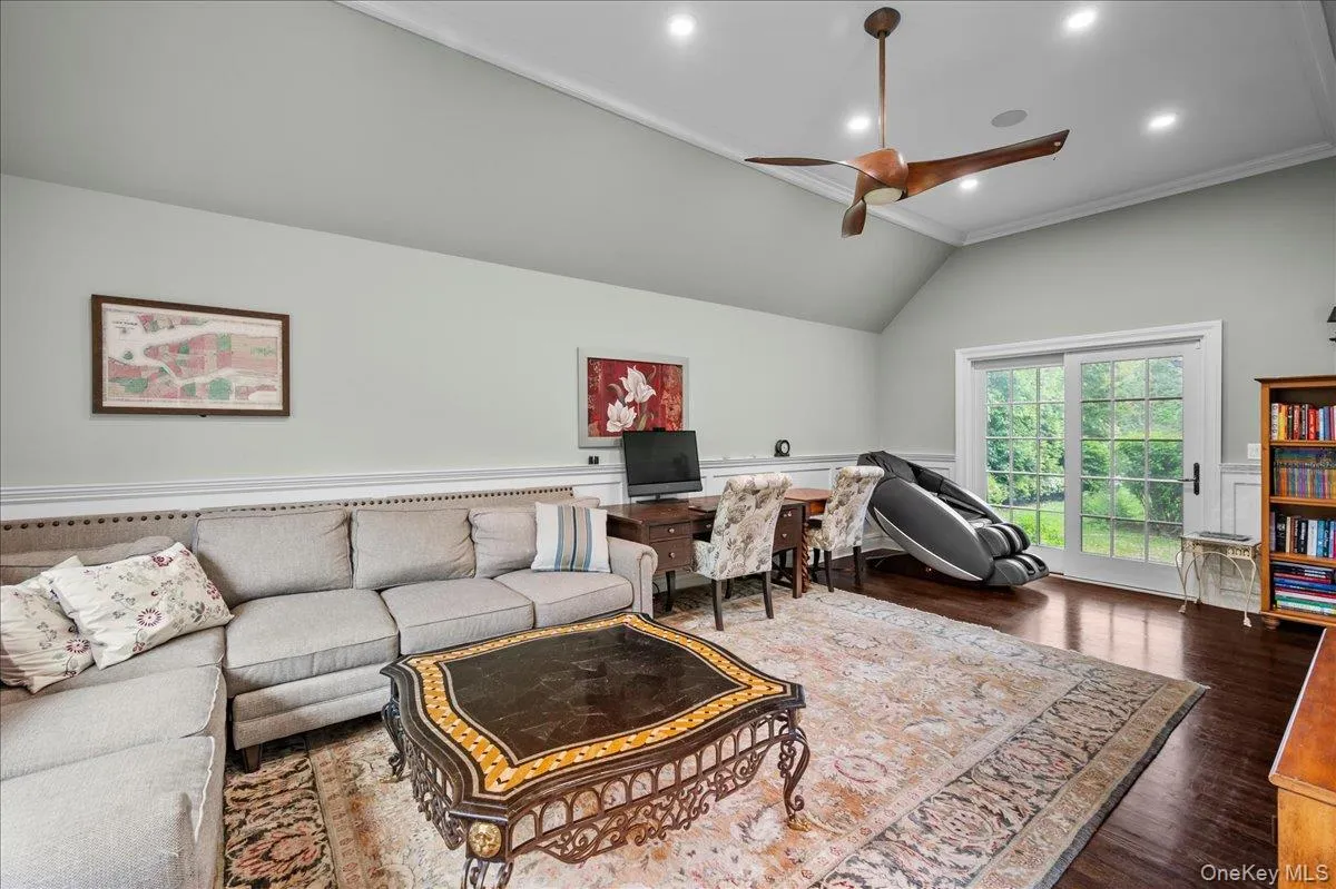 Alternative view of the expansive family room located on the main level near Alternative view of the expansive family room located on the main level near