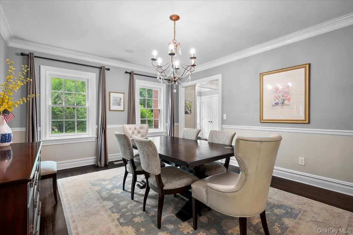 The formal dining is also located off the formal entrance hall and features direct access to the luxurious chef's kitchen. The formal dining is also located off the formal entrance hall and features direct access to the luxurious chef's kitchen.