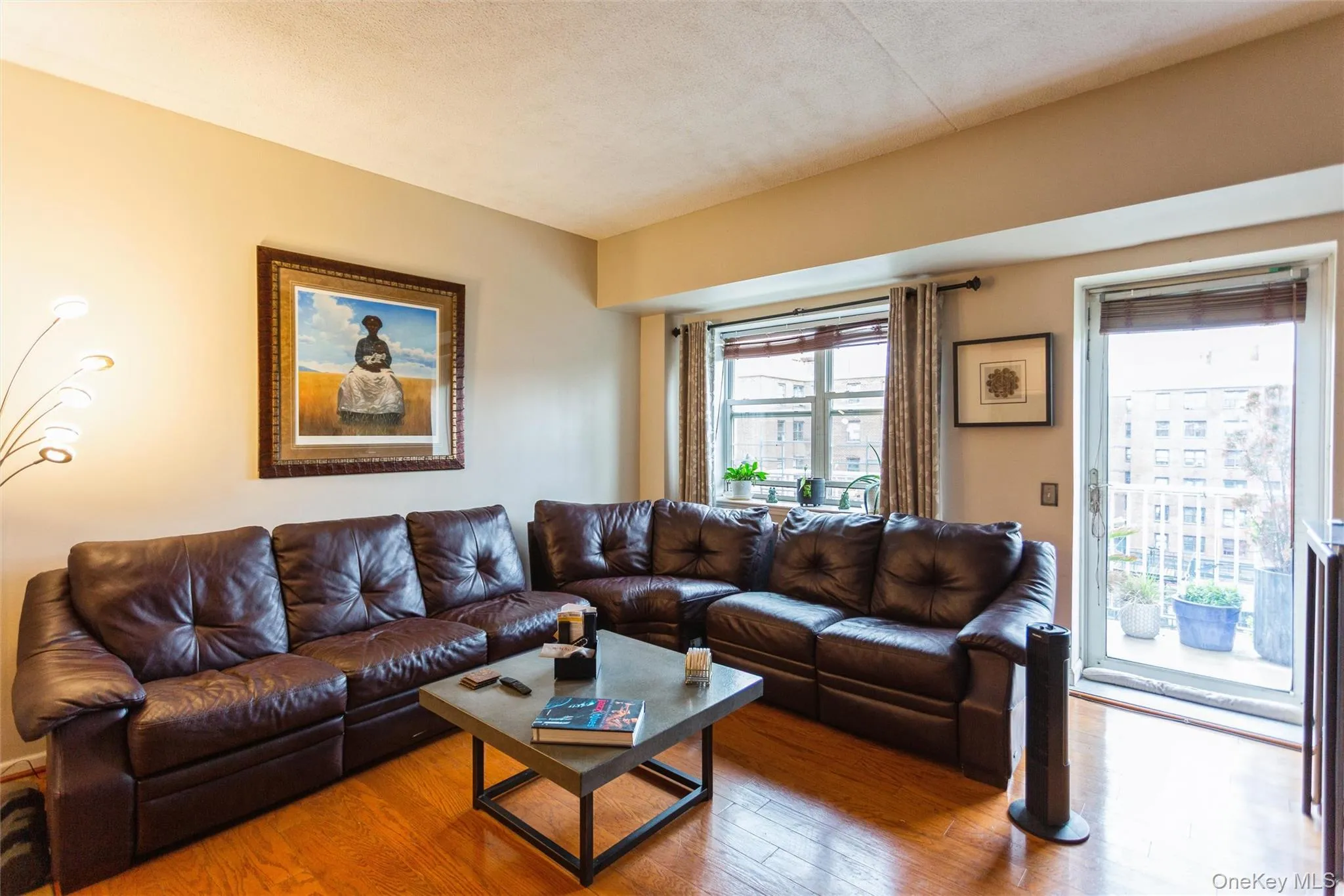 Bright and inviting living area with oversized windows, abundant natural light, and seamless indoor-outdoor living. Bright and inviting living area with oversized windows, abundant natural light, and seamless indoor-outdoor living.