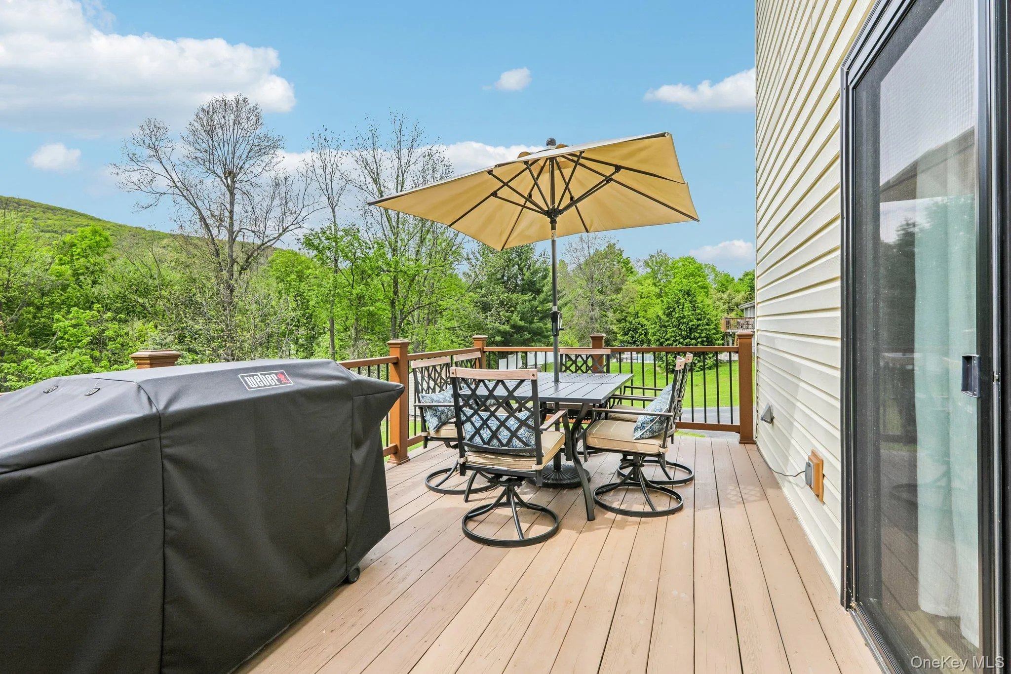 Large private deck offering vinyl railings. Large private deck offering vinyl railings.