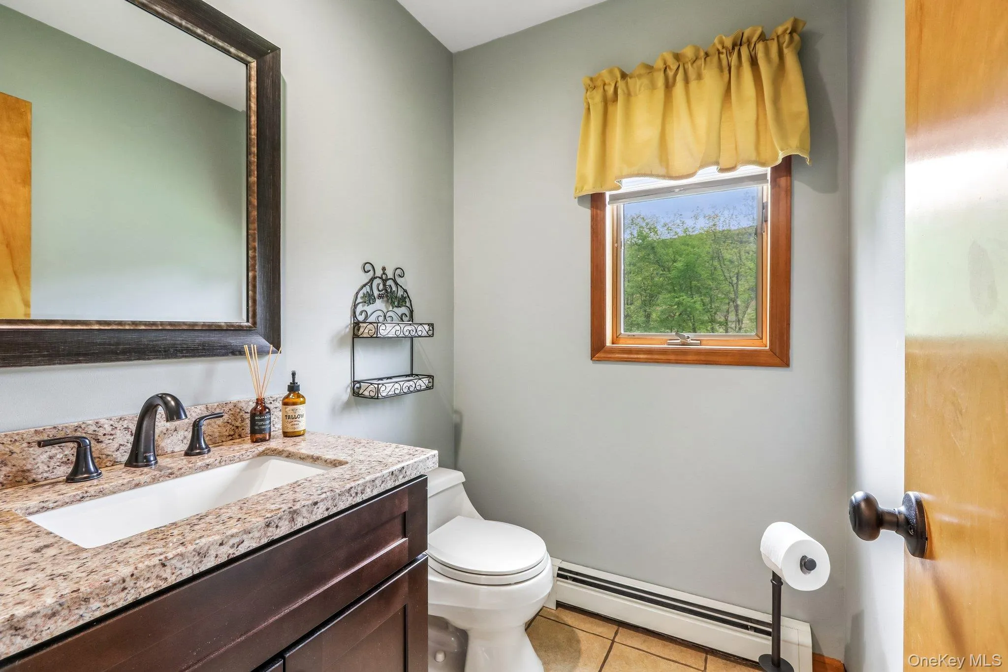 Half bath has granite countertops, tile floor and vinyl plank floors. Half bath has granite countertops, tile floor and vinyl plank floors.