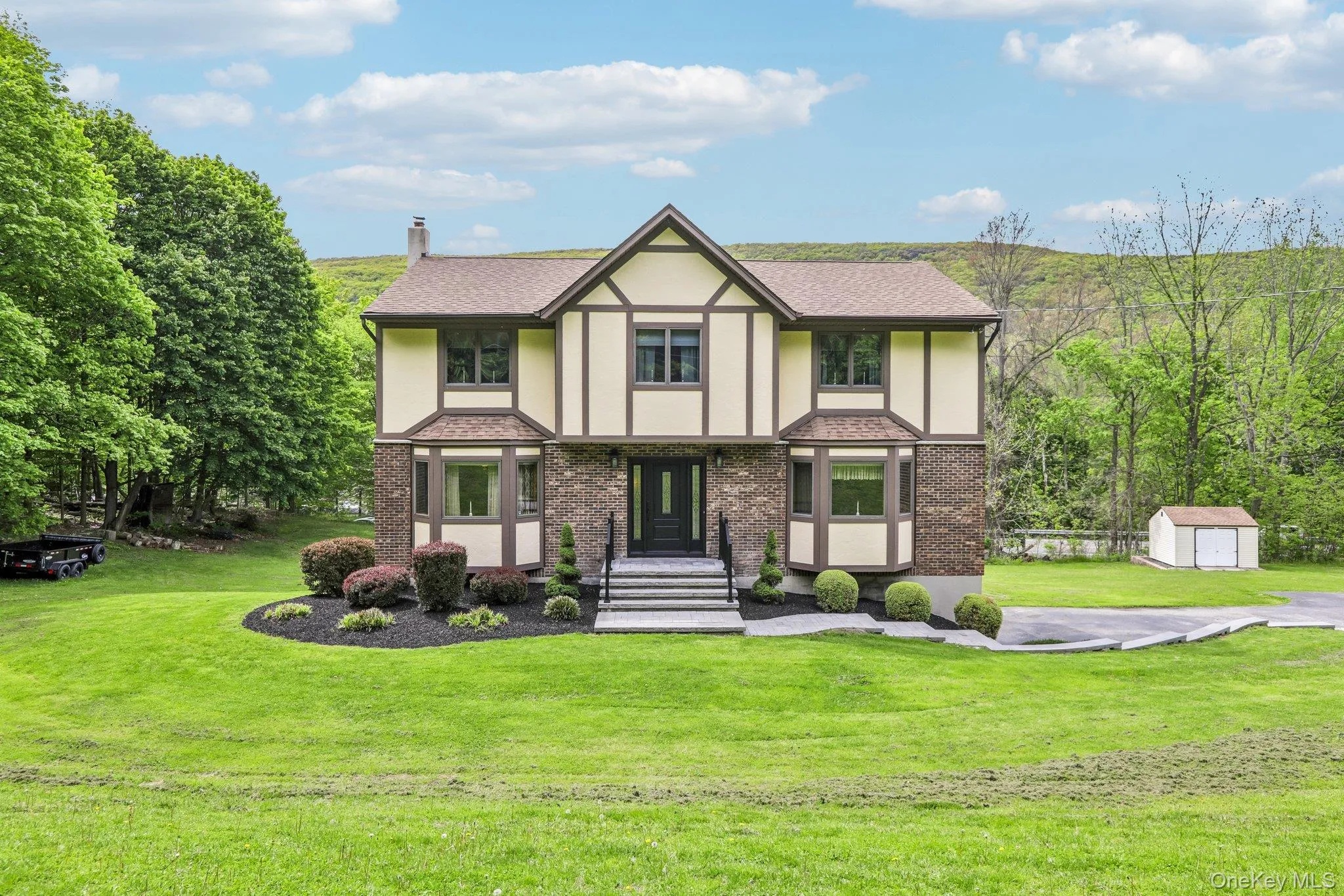 Tudor Style Colonial home. Tudor Style Colonial home.